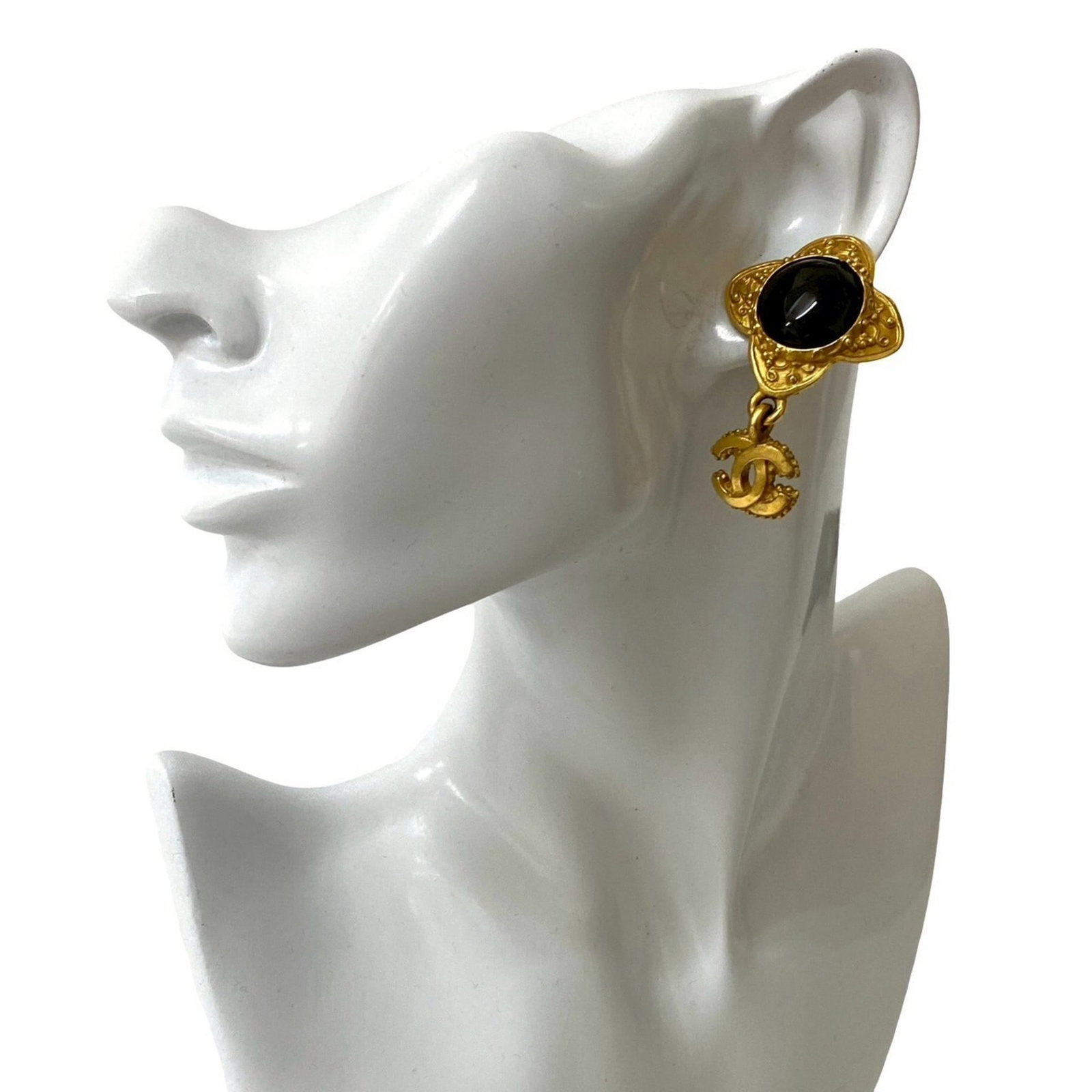 Clip earrings gold plating by Chanel: Clip earrings gold plating by Chanel Gold-plated clip earrings from the iconic Chanel brand, featuring a sleek black finish and subtle gold accents. Measuring 50mm x 33mm in size, these earrings showc