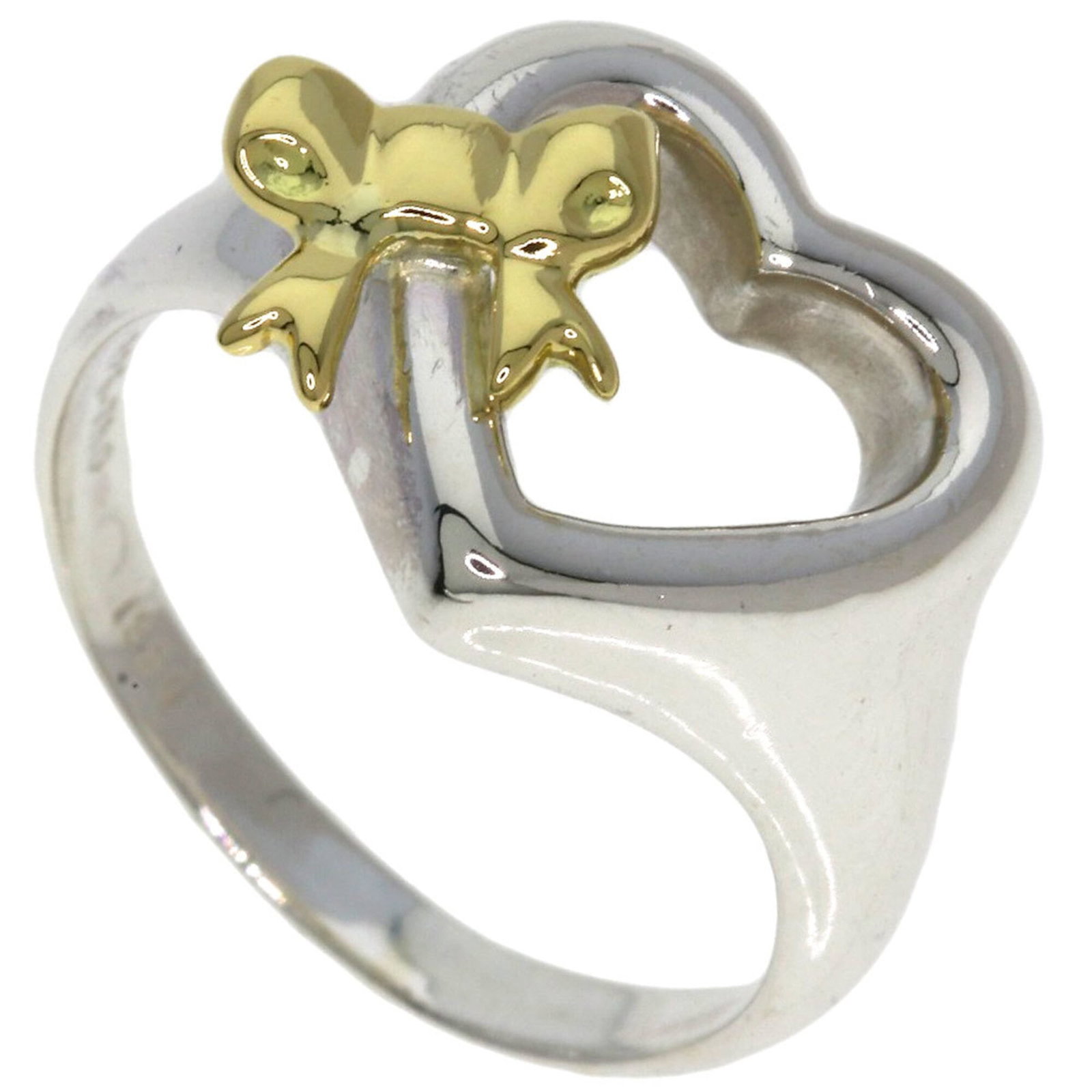 Yellow Gold Tiffany Silver Band Ring 18K: Yellow Gold Tiffany Silver Band Ring 18K 18K Yellow Gold and Silver Band Ring in a luxurious Tiffany setting, offering a striking combination of warm tones. This high-quality ring features a silver ba