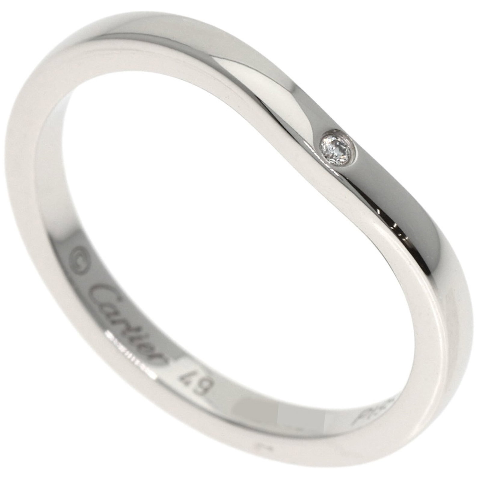 Cartier Band Ring: Cartier Band Ring Cartier Band Ring in Platinum, featuring a diamond stone and sleek design. This used band ring showcases a few traces of usage with minor scratches and dirt, still in very good