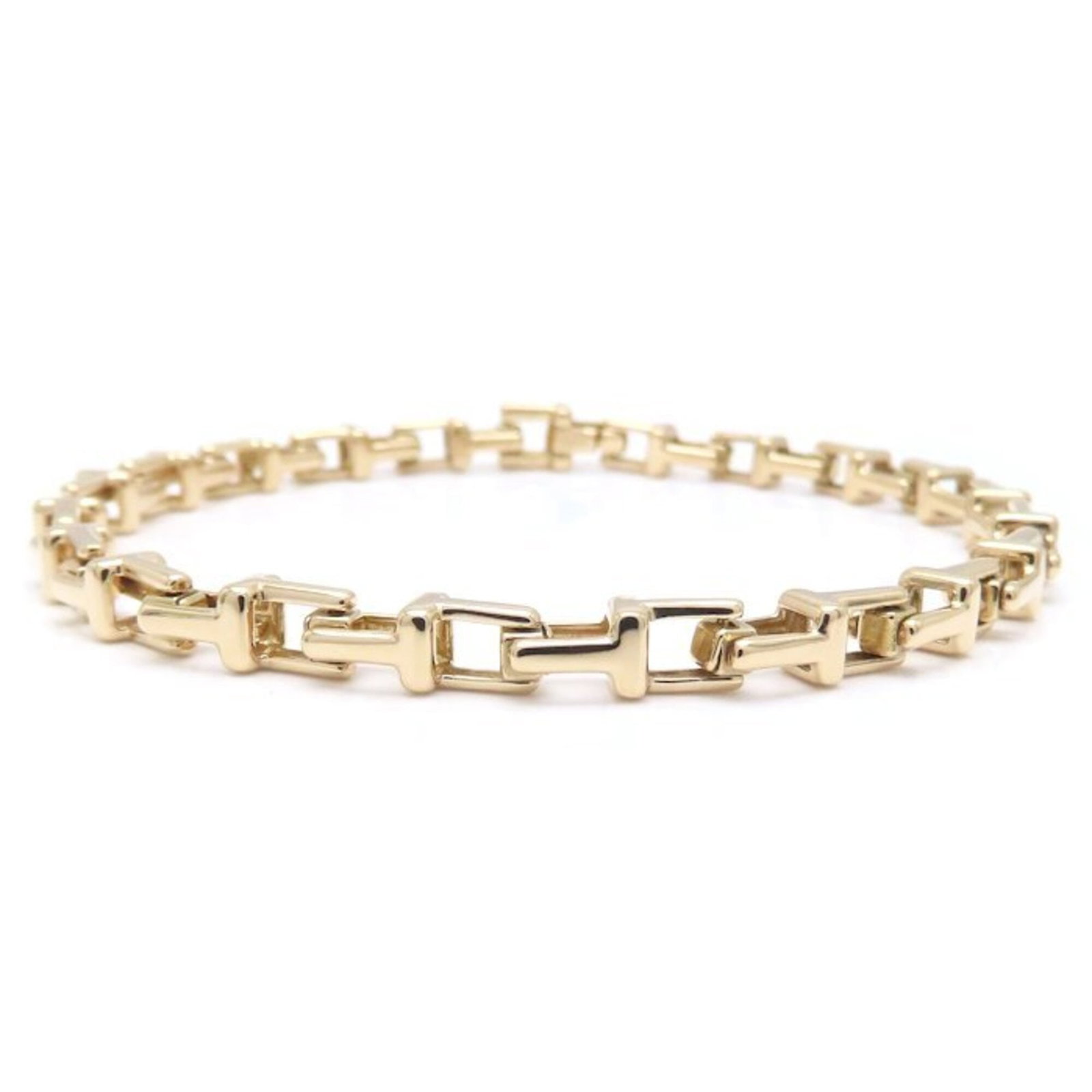Pink Gold 18K Tiffany Charm Bracelet: Pink Gold 18K Tiffany Charm Bracelet Pink Gold 18K Tiffany Charm Bracelet - A lovely, used (like new) charm bracelet in pink gold, featuring a classic design with a subtle shine. Measuring 17.5cm in l