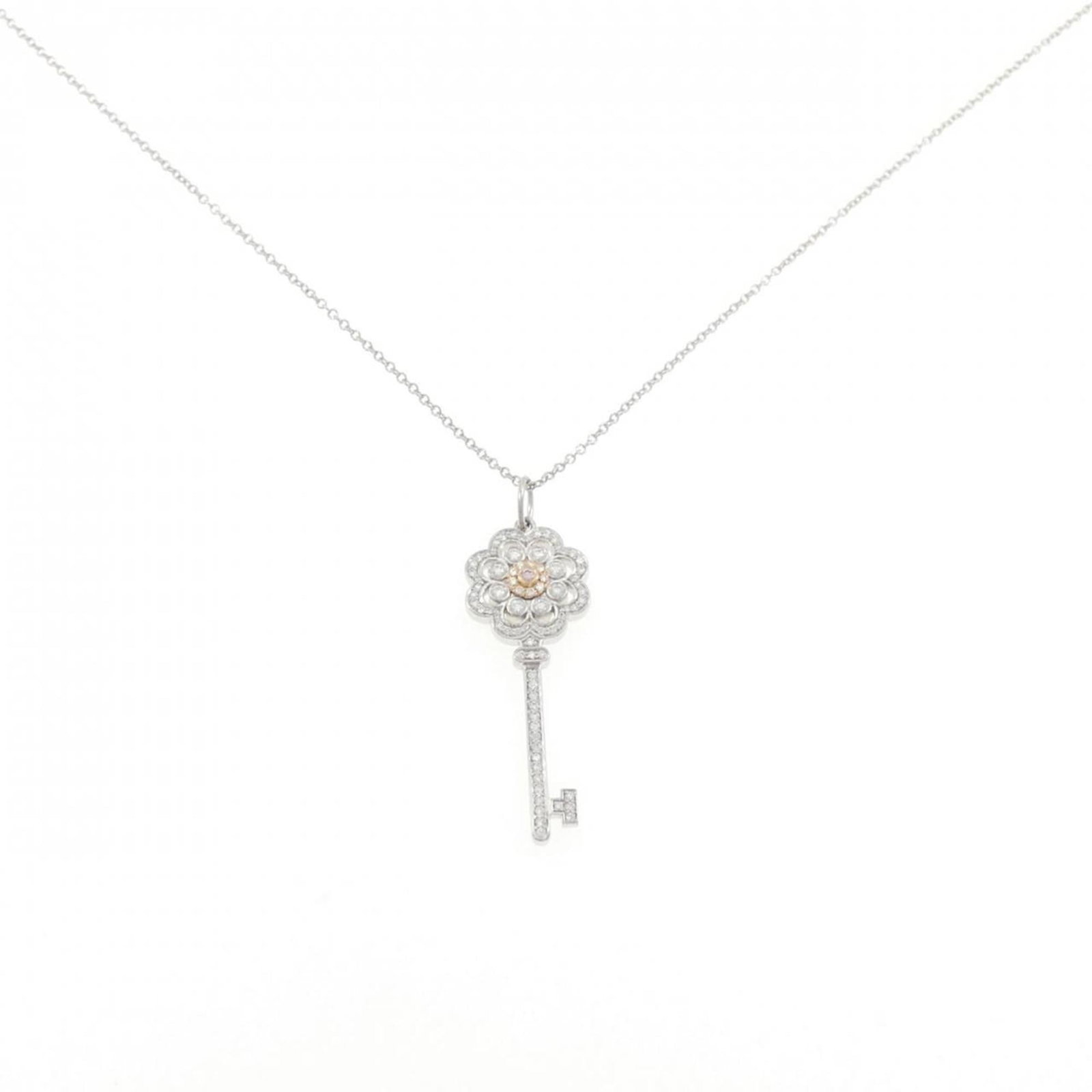 Rose Key Tiffany Necklace: Rose Key Tiffany Necklace Pink Gold (18K) and Platinum Rose Key Tiffany Necklace, featuring a 32.2mm x 11.5mm pendant with a 45 cm / 17.71'' neck circumference, crafted in a unique design that