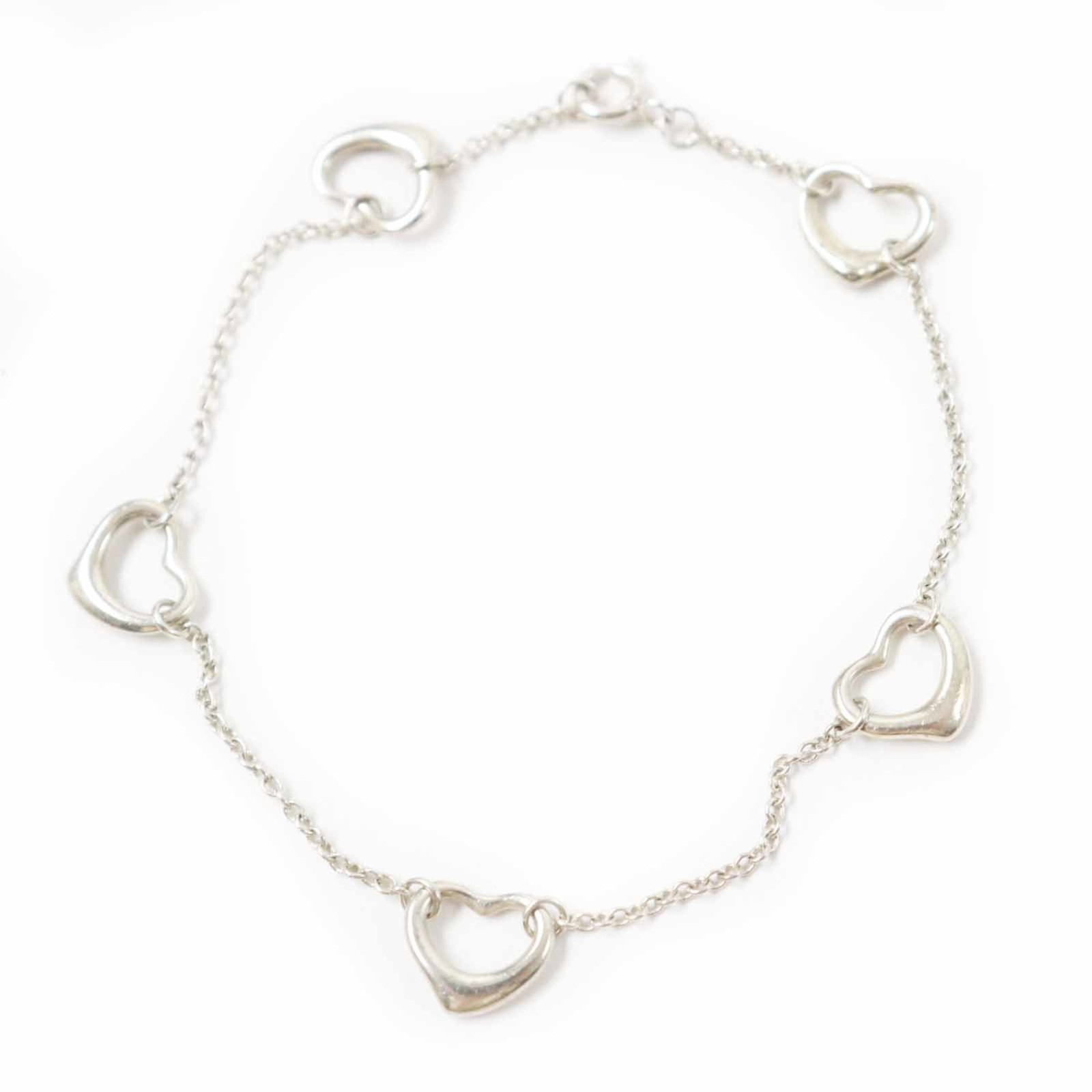 Tiffany Charm of Bracelet: Tiffany Charm of Bracelet Silver Tiffany charm bracelet with a length of 20.5cm and a weight of 3.7g, featuring a silver925 metal construction. The bracelet has traces of usage, scratches, and dirt,
