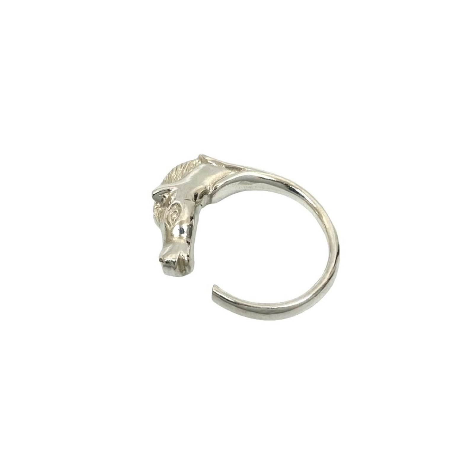 Ring Hermes Silver Band 925: Ring Hermes Silver Band 925 Silver band ring from Hermes, made from high-quality silver alloy (925). This used ring shows signs of wear and has minor scratches, but remains in good condition. A classi