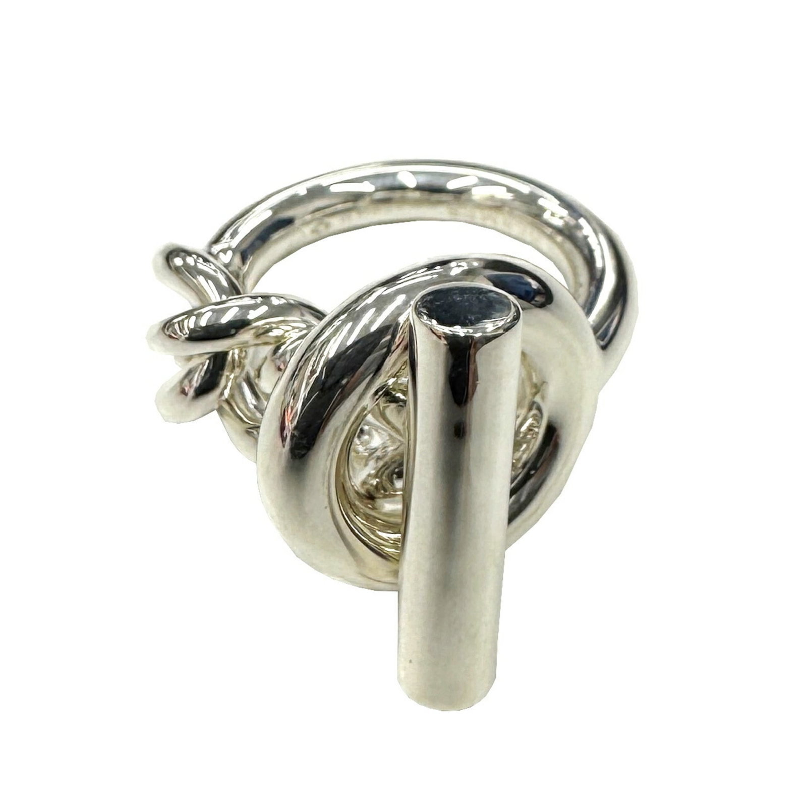 Ring Hermes Silver Band 925: Ring Hermes Silver Band 925 Silver band ring from Hermes, made from high-quality 925 silver. Weighing in at 16.3g, this open ring features a sleek and modern design. In excellent condition, the ring b