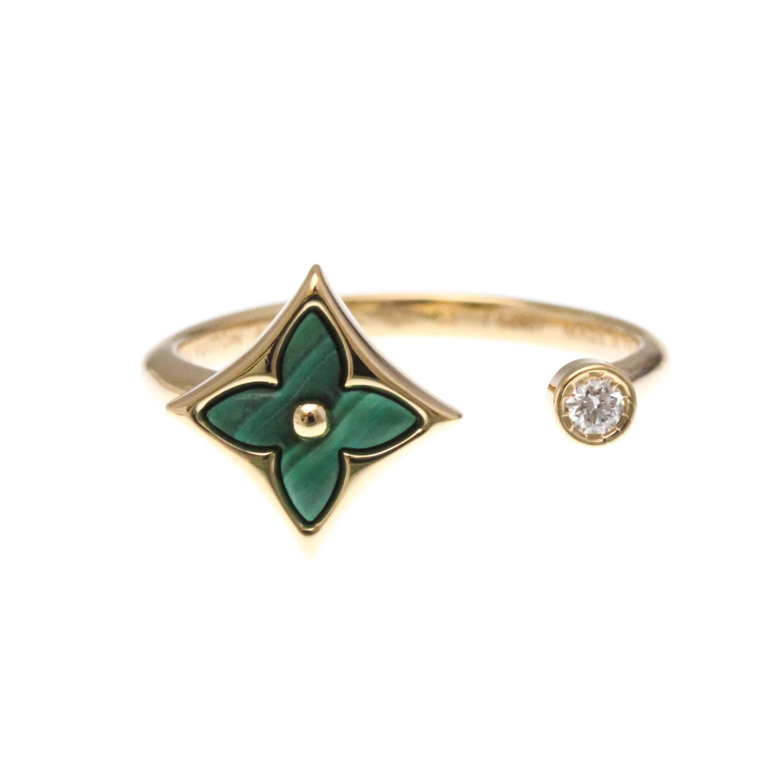 Pink Gold Band Ring Louis Vuitton 18K: Pink Gold Band Ring Louis Vuitton 18K Pink Gold Band Ring Louis Vuitton 18K features an elegant design with a pink gold band and diamond-studded accents, set against a backdrop of malachite. This 18k 