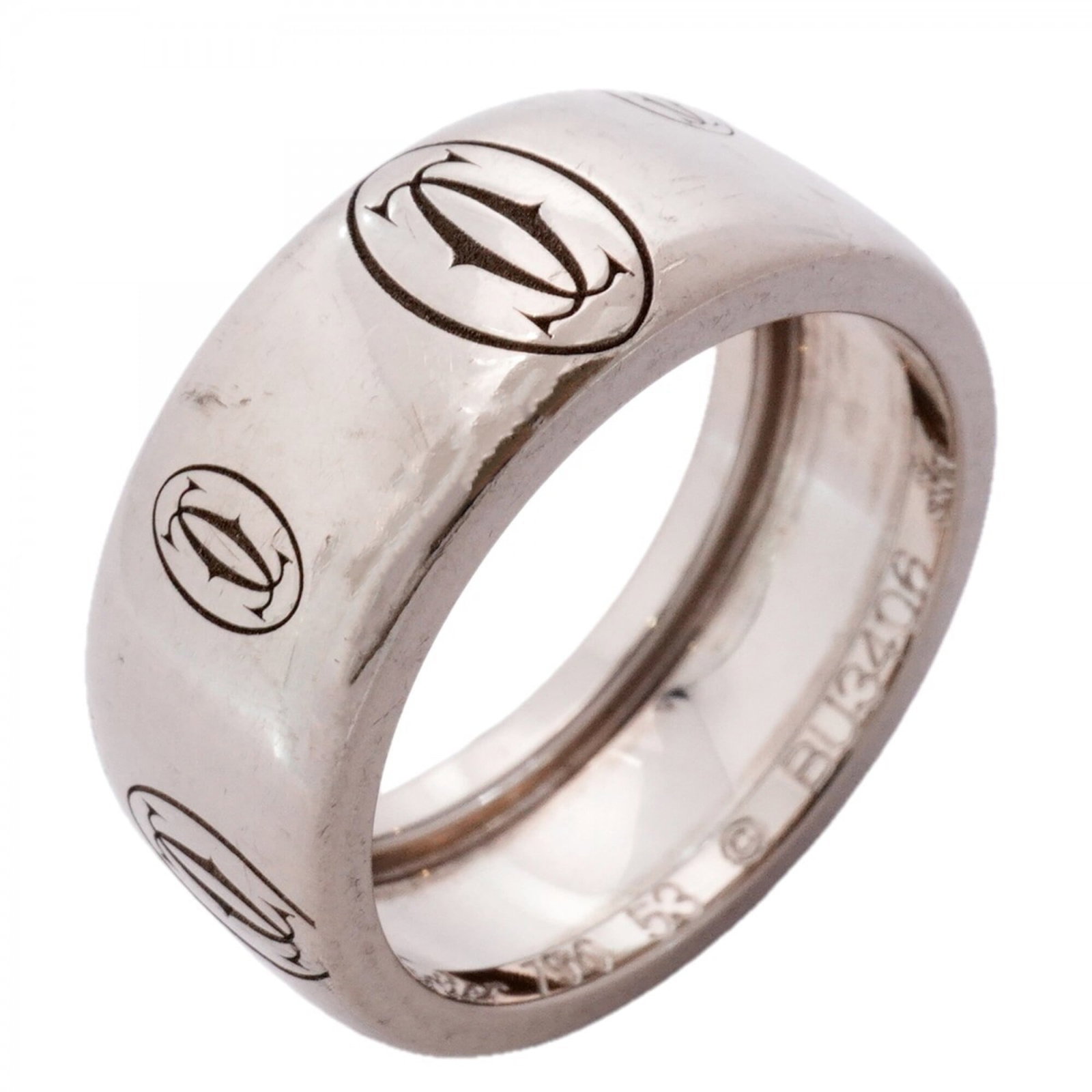 White Gold Cartier Band Ring 18K: White Gold Cartier Band Ring 18K White Gold Cartier Band Ring 18K features an 18K white gold band, bearing the iconic Cartier brand. The ring has been worn and shows signs of usage, with minor