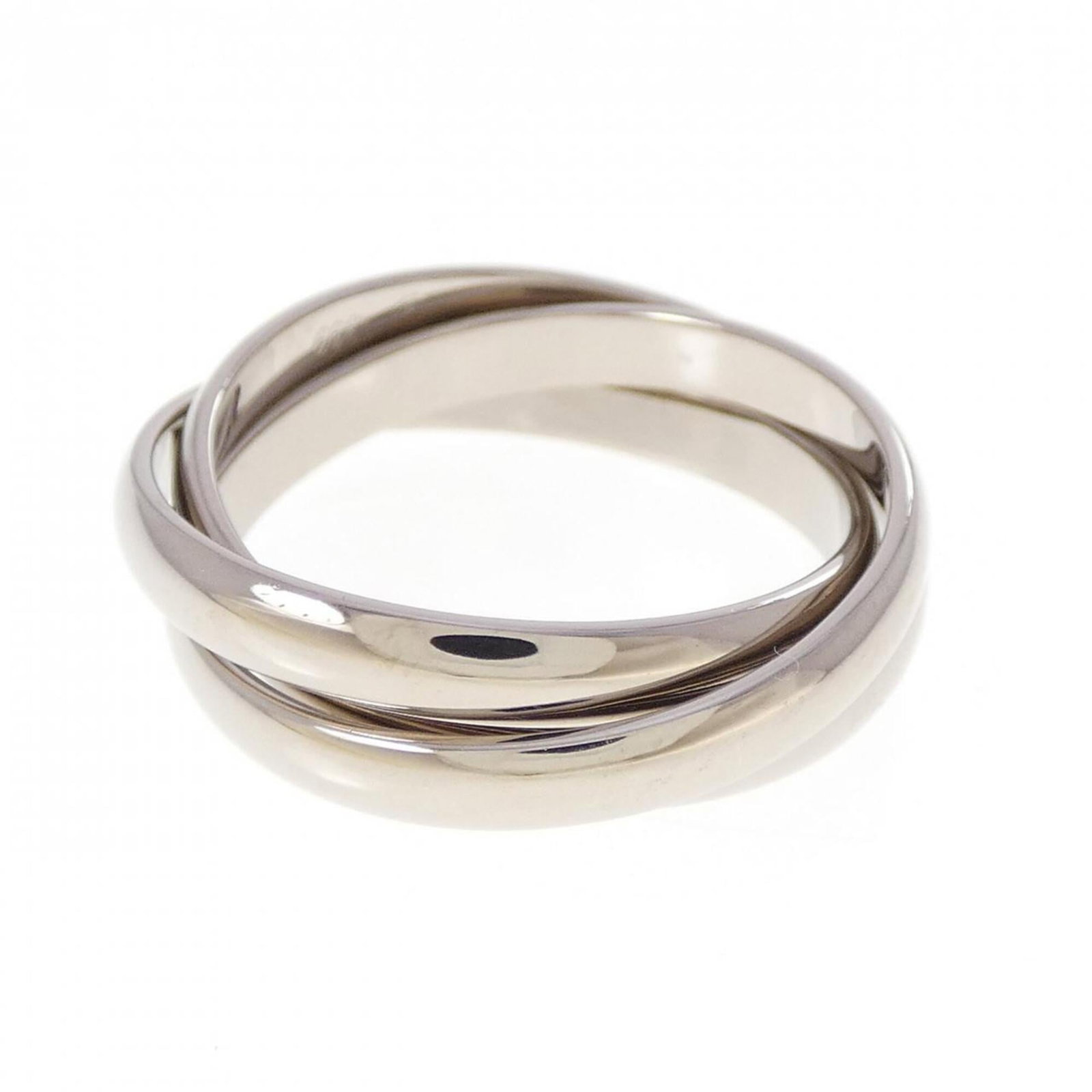White Gold Cartier Band Ring 18K: White Gold Cartier Band Ring 18K White Gold Cartier Band Ring 18K features an 18-karat white gold construction, bearing a signature. The band ring has undergone some wear and tear, with minor