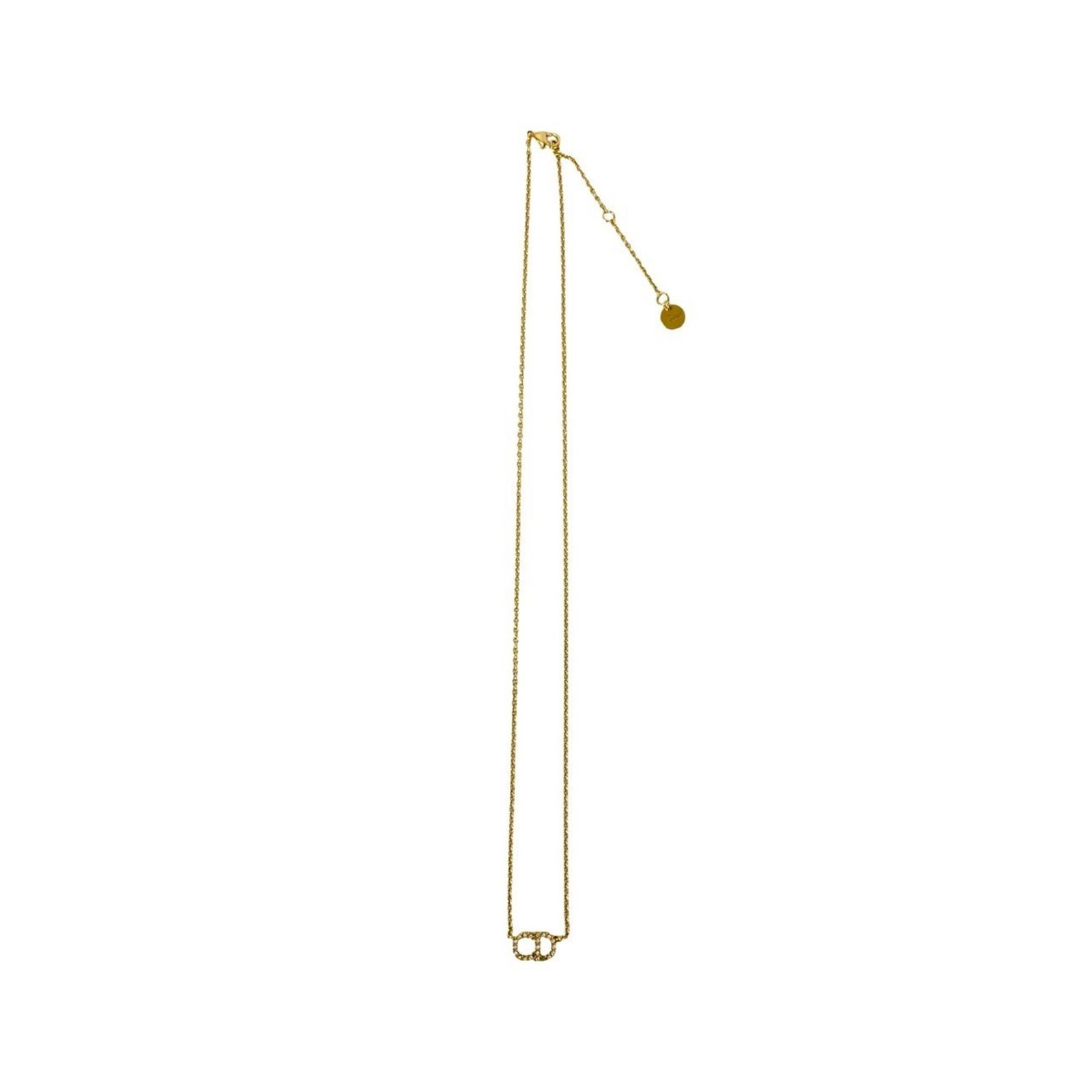 Gold Christian Dior Cd Pendant Necklace Choker 73931 Rhinestone: Gold Christian Dior Cd Pendant Necklace Choker 73931 Rhinestone Gold Christian Dior Cd Pendant Necklace Choker 73931 Rhinestone is a gold-plated necklace featuring a rhinestone pendant. The chain