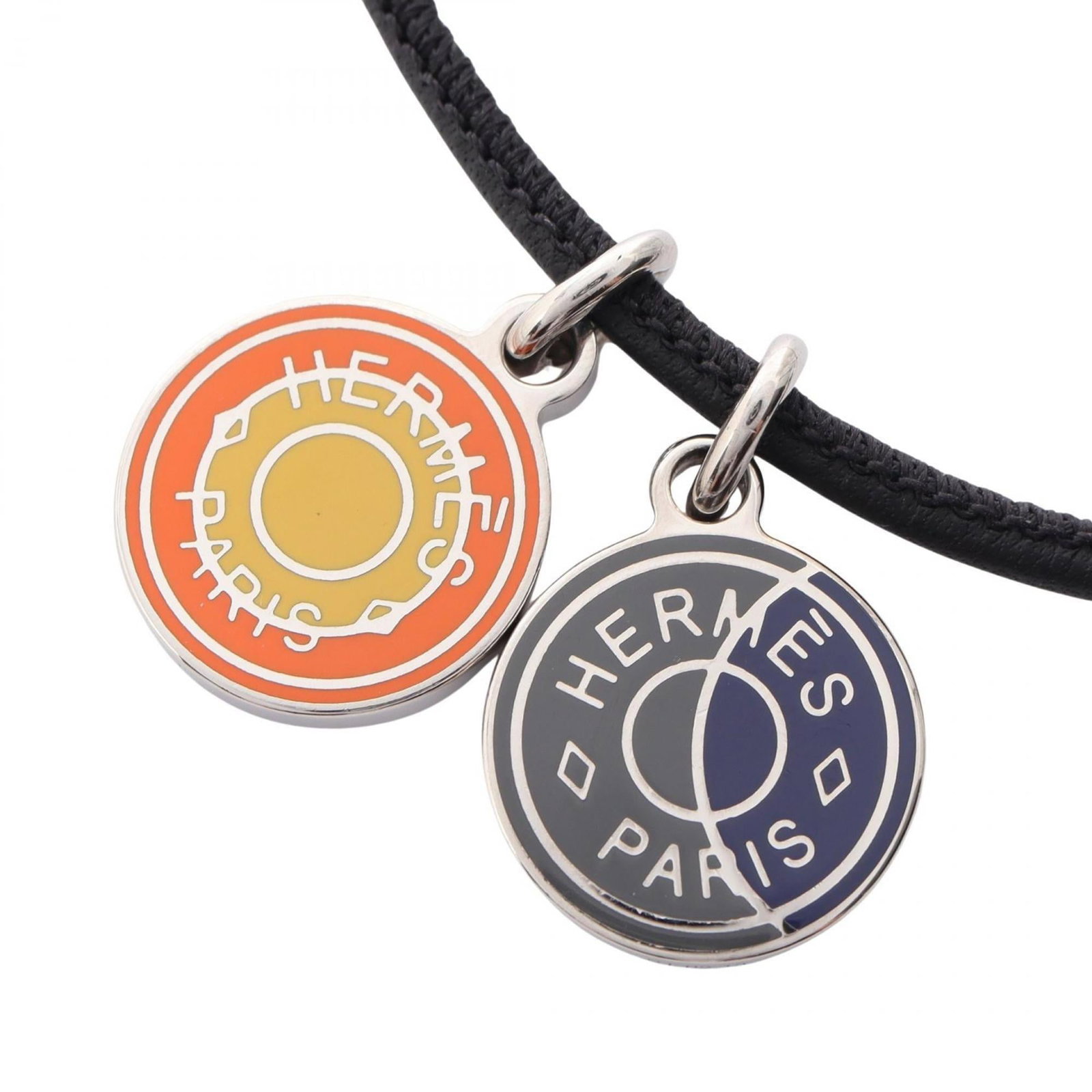 Hermes herms silver black leather stainless steel necklace eclipse: Hermes herms silver black leather stainless steel necklace eclipse Black leather and stainless steel meet elegant silver accents in this Hermes herms eclipse necklace, featuring a 14mm x 14mm