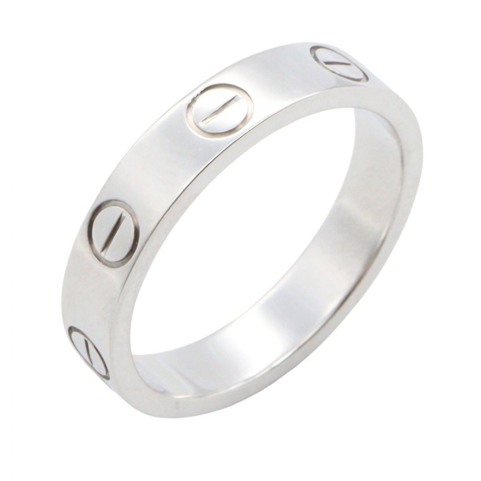 White Gold Band Ring by Cartier: White Gold Band Ring by Cartier White Gold Band Ring by Cartier, featuring a classic design with a few traces of usage, some scratches / dirt visible. This used band ring is made from white gold and f