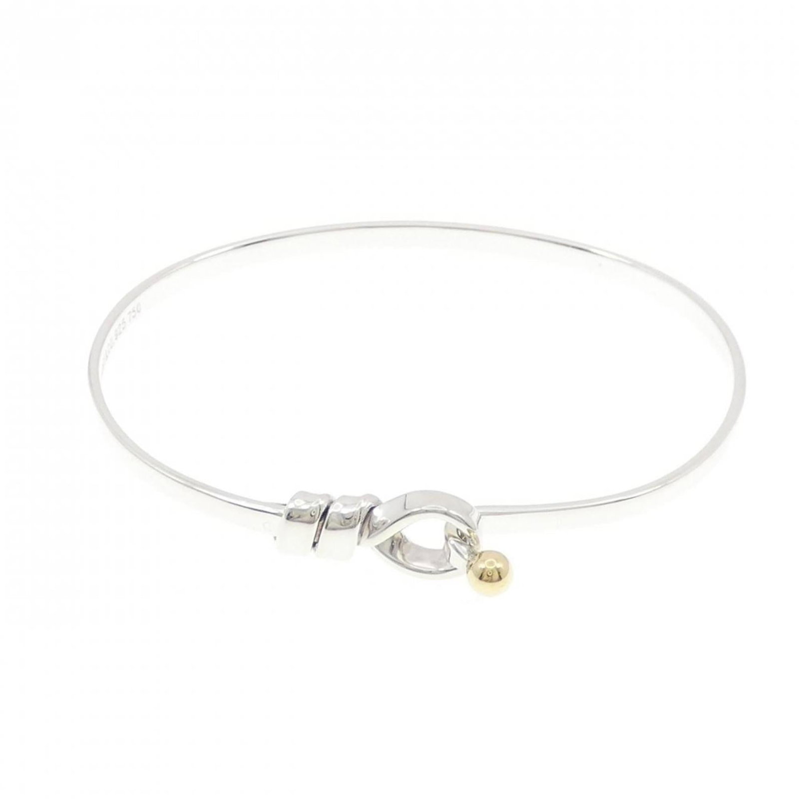 Tiffany Bangle Silver 925 Yellow Gold (18K): Tiffany Bangle Silver 925 Yellow Gold (18K) Silver 925 and 18K Yellow Gold combine in this elegant Tiffany bangle, crafted with attention to detail. Measuring 16.5cm in length, it boasts a classic des
