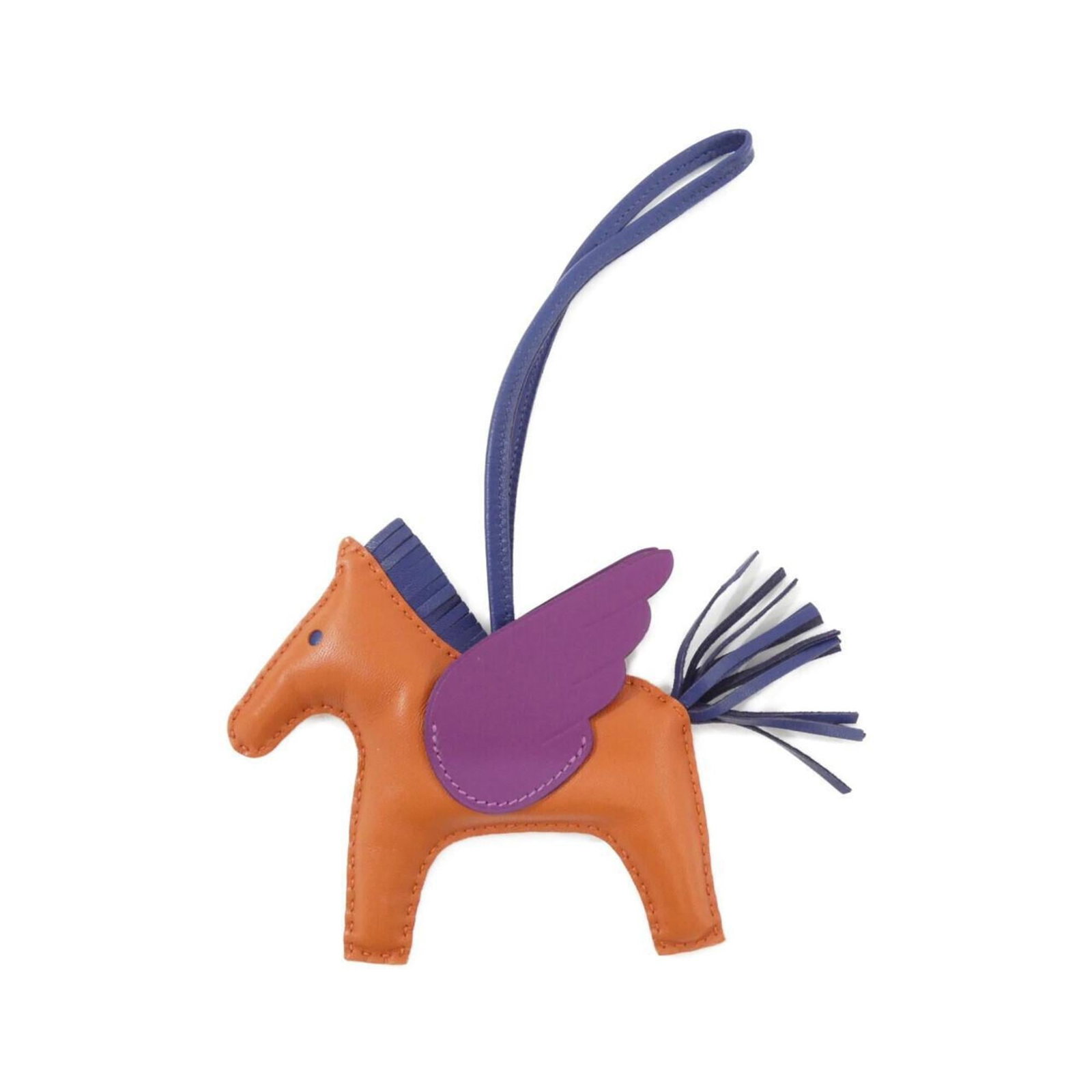 Hermes Handbag Charm Agneau Milo: Hermes Handbag Charm Agneau Milo Agneau Milo, the iconic material from Herm?s, gives this handbag charm its distinctive look and feel. Made with Anemone and Blue hues, it's a beautiful example of the
