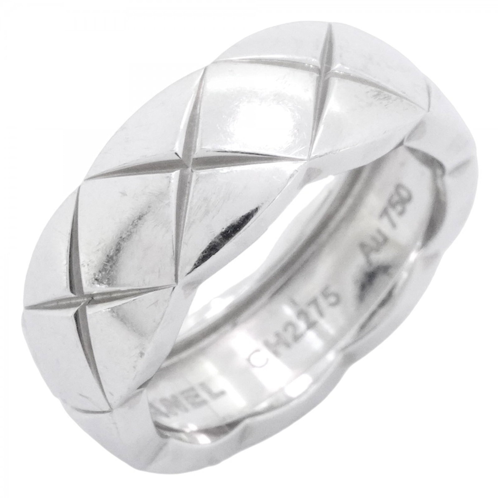 Chanel White Gold Ring Band 18K: Chanel White Gold Ring Band 18K This 18K white gold band ring from Chanel features a sleek and elegant design. With its classic style, it showcases the luxurious feel of high-quality white gold. The