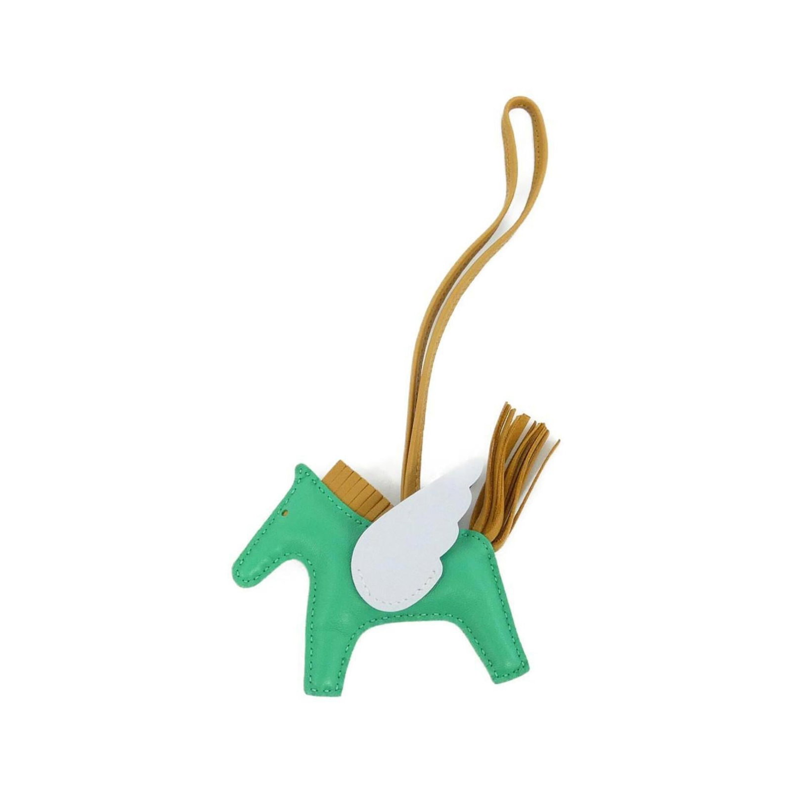 Hermes Handbag Charm Agneau Milo: Hermes Handbag Charm Agneau Milo Agneau Milo, the signature material from Hermes, gives this charm its unique texture and character. With a few traces of usage visible, this used charm still retains i