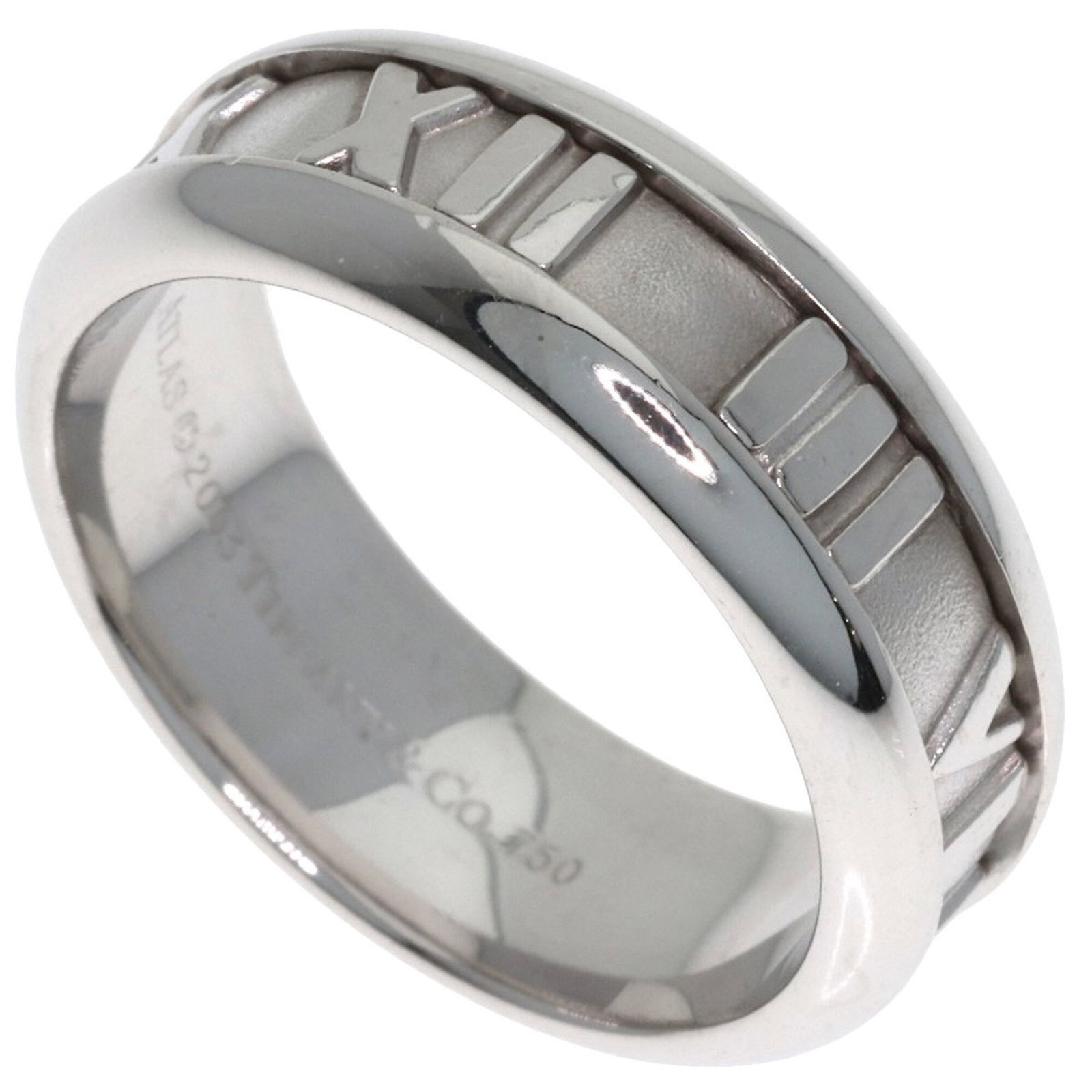 Tiffany Band Ring White Gold (18K): Tiffany Band Ring White Gold (18K) Tiffany Band Ring White Gold (18K) - A pre-owned, high-quality band ring featuring white gold (18K) construction. The item bears a few traces of usage and minor