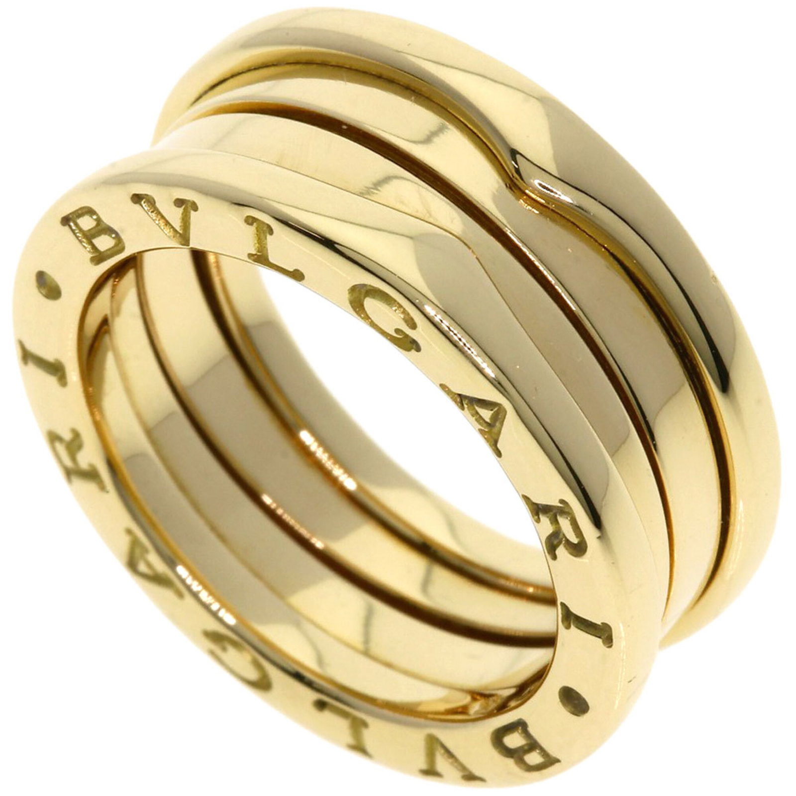 Bvlgari Band Ring: Bvlgari Band Ring Bvlgari Band Ring in 18K Gold, featuring a bright yellow metal tone and a slender 7.6mm width, sits comfortably on the finger with an 8.7g weight. The ring boasts a classic band
