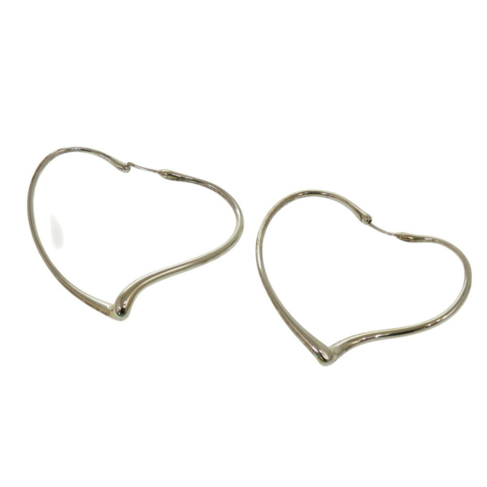 Tiffany Hoop Earrings Silver 925: Tiffany Hoop Earrings Silver 925 Silver 925 Tiffany Hoop Earrings with a classic design, measuring 40.00mm x 50.00mm in size, are up for auction. The earrings have traces of usage and show minor scrat