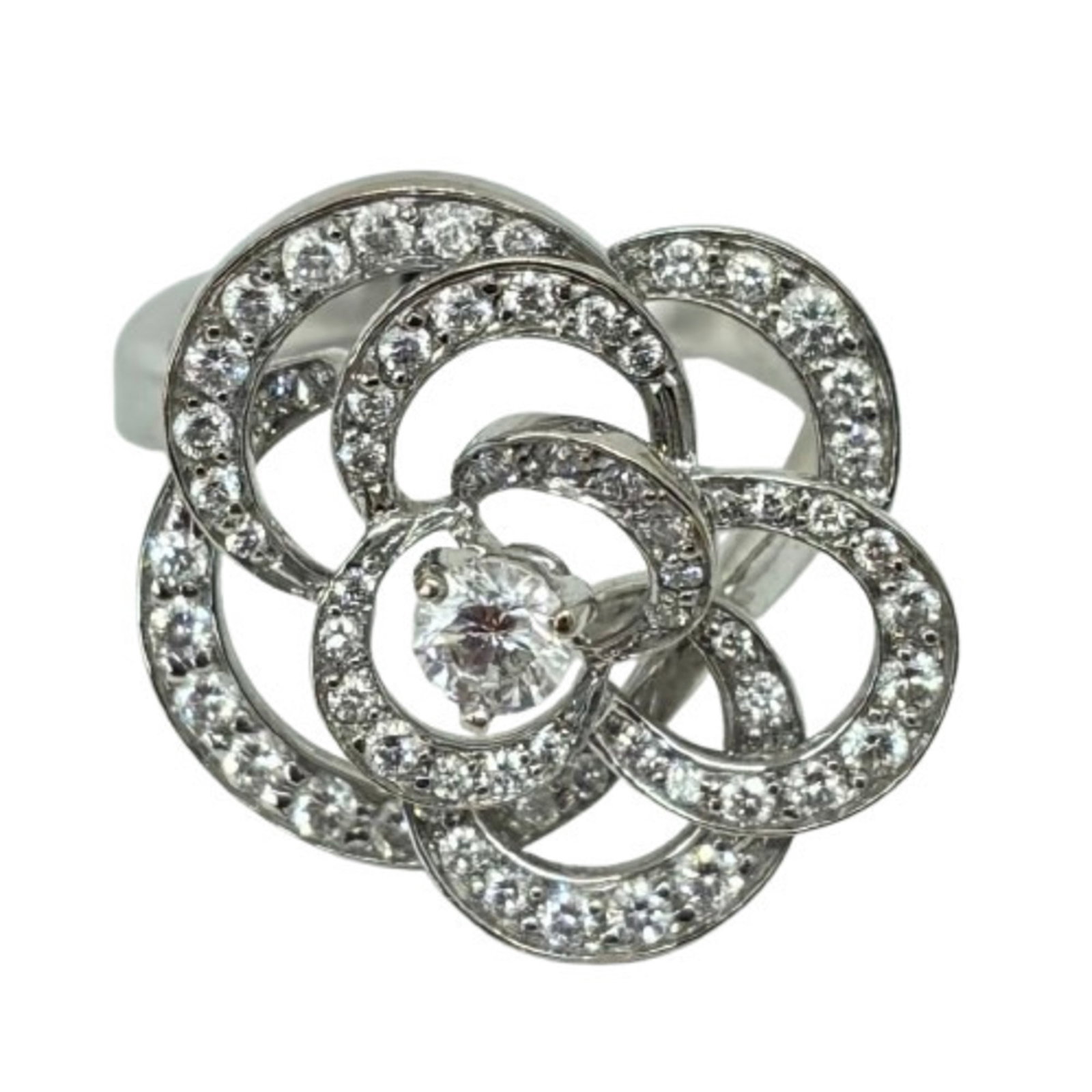 Chanel White Gold Ring Band 18K: Chanel White Gold Ring Band 18K This 18K white gold band ring from Chanel features a sleek, sophisticated design. With its classic style and high-quality materials, it's a timeless piece that adds