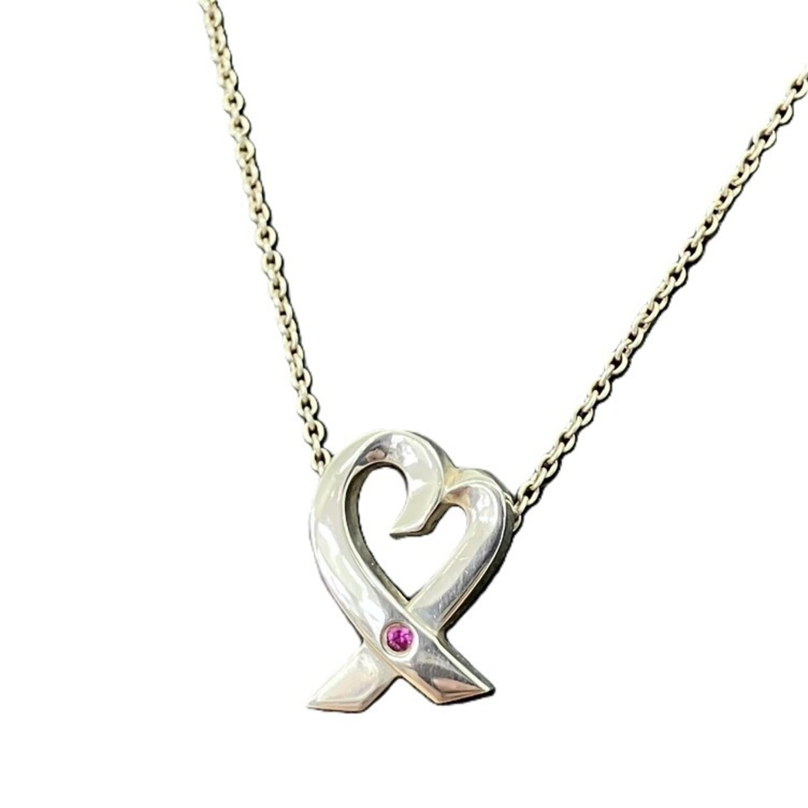 Loving heart pink sapphire 925 necklace from Tiffany and Co. by Paloma Picasso: Loving heart pink sapphire 925 necklace from Tiffany and Co. by Paloma Picasso Lovely pink sapphire pendant, part of the iconic Tiffany and Co. by Paloma Picasso collection, shines in sterling silver 