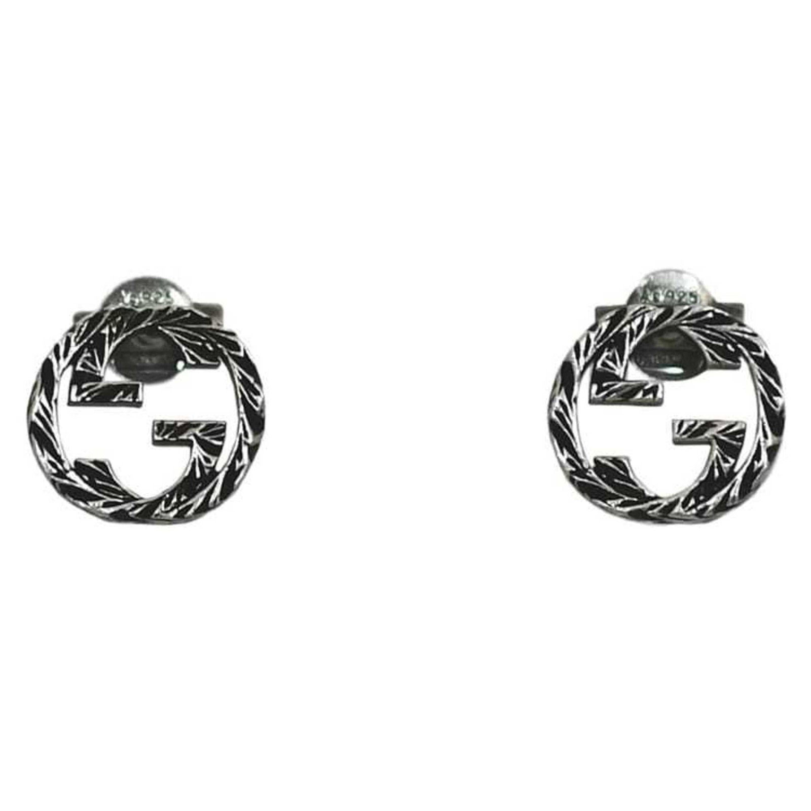 Gucci stud earrings silver 925: Gucci stud earrings silver 925 Silver 925 Gucci stud earrings with a sleek, modern design. Made from high-quality silver alloy, these elegant earrings feature a subtle shine and understated
