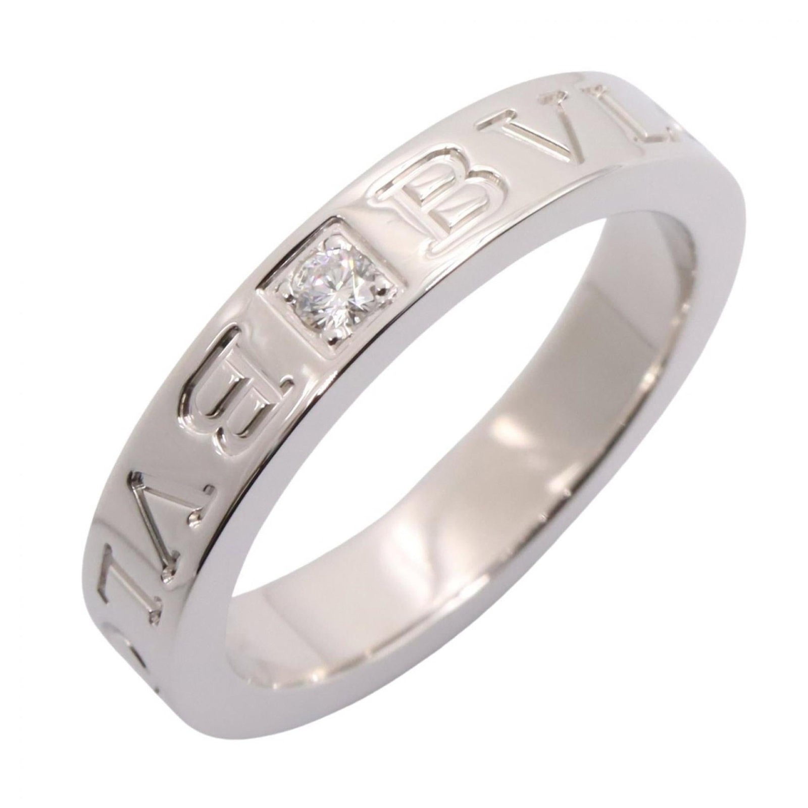 Bvlgari Band Ring White Gold (18K): Bvlgari Band Ring White Gold (18K) Bvlgari Band Ring White Gold (18K) is a sleek, silver band ring featuring clear stones set in white gold. Made from high-quality 18K white gold, this piece boasts a