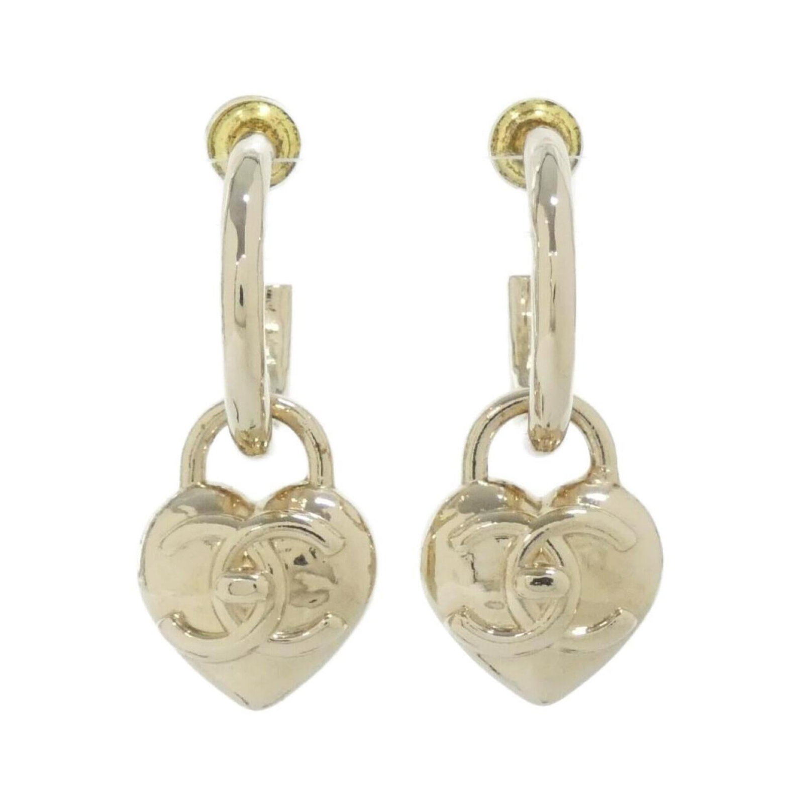 Chanel Stud Earrings: Chanel Stud Earrings Stud earrings in gold, bearing the iconic Chanel brand. The classic design features a simple stud style with a subtle flair, adding a touch of sophistication to any outfit. With m
