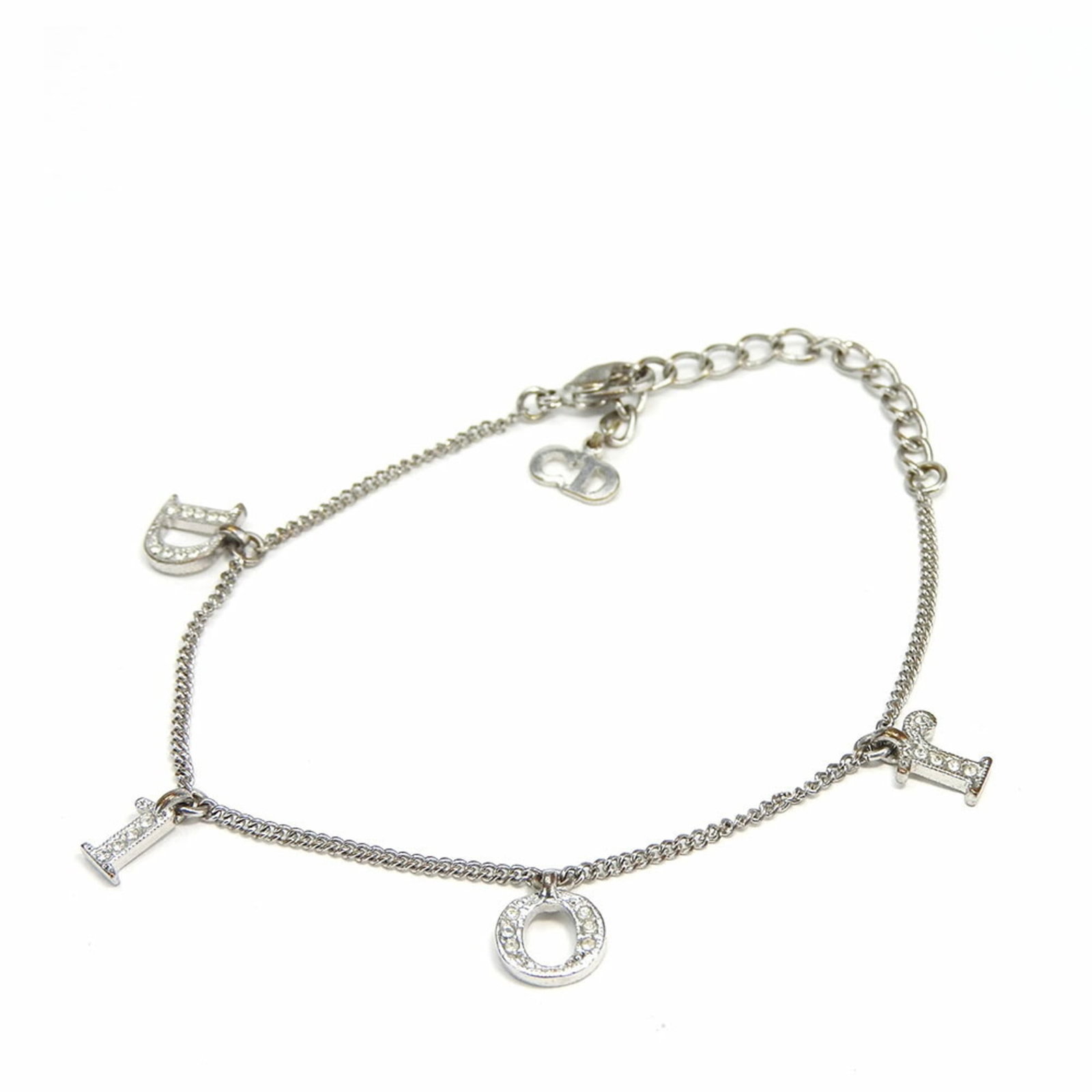 Metal Charm Christian Dior: Metal Charm Christian Dior Item Specifics: Brand: Christian Dior Type: Charm Bracelet Gender: Women Material: Metal Color: Silver Stone: Rhinestone Weight: 4.3g / 0.15oz. Total Length: 23cm / 9.05''