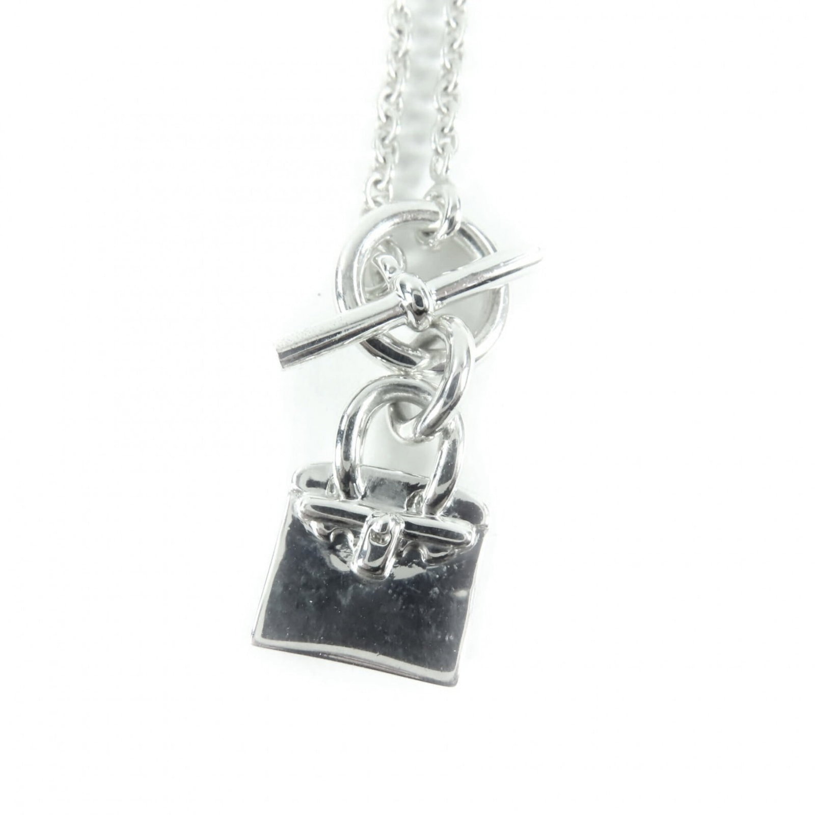 Hermes 925 Amulette Birkin Necklace Pendant Accessory Silver Made In Italy Weight 10.83G Women'S: Hermes 925 Amulette Birkin Necklace Pendant Accessory Silver Made In Italy Weight 10.83G Women'S Silver 925 Amulette Birkin Necklace Pendant Accessory Made In Italy, featuring a 15mm x 10mm pendant wi