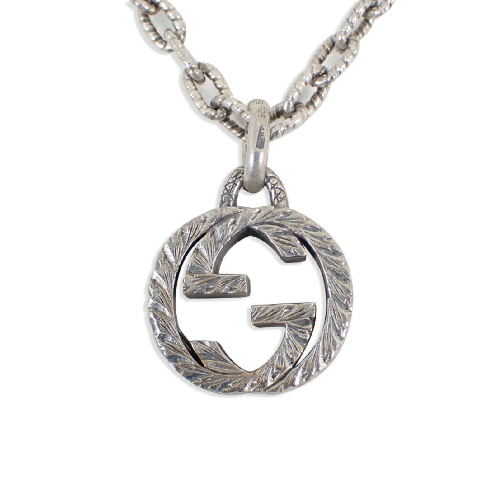 925 Interlocking G Pendant Necklace by Gucci: 925 Interlocking G Pendant Necklace by Gucci Sterling silver pendant necklace by Gucci, featuring an interlocking G design. This 925 sterling silver piece boasts a sleek and modern aesthetic, with a s