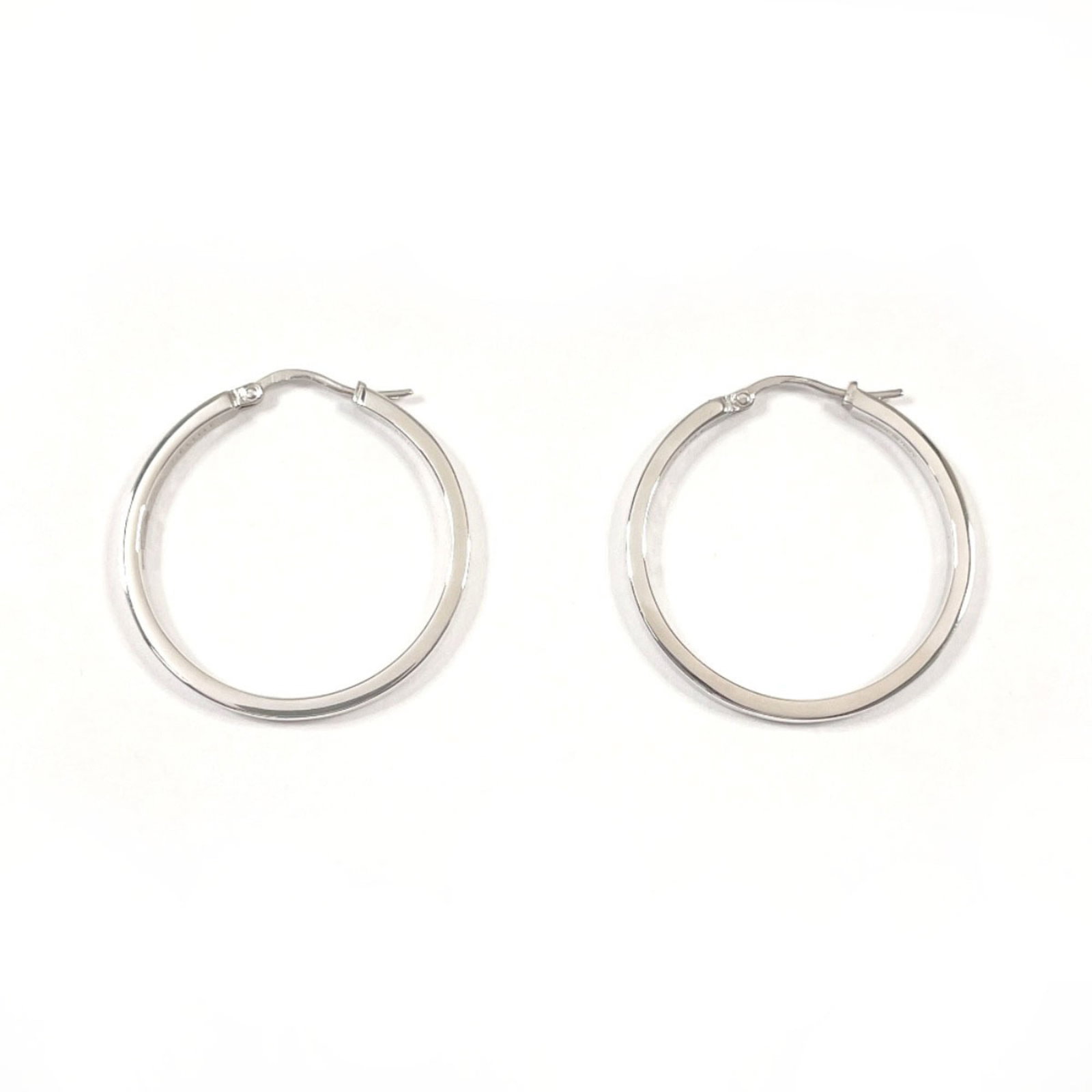 Celine Hoop Earrings Silver 925: Celine Hoop Earrings Silver 925 Silver 925 Celine Hoop Earrings offer a sleek, modern touch to any outfit. Made from high-quality silver, these earrings feature a classic hoop design with a subtle