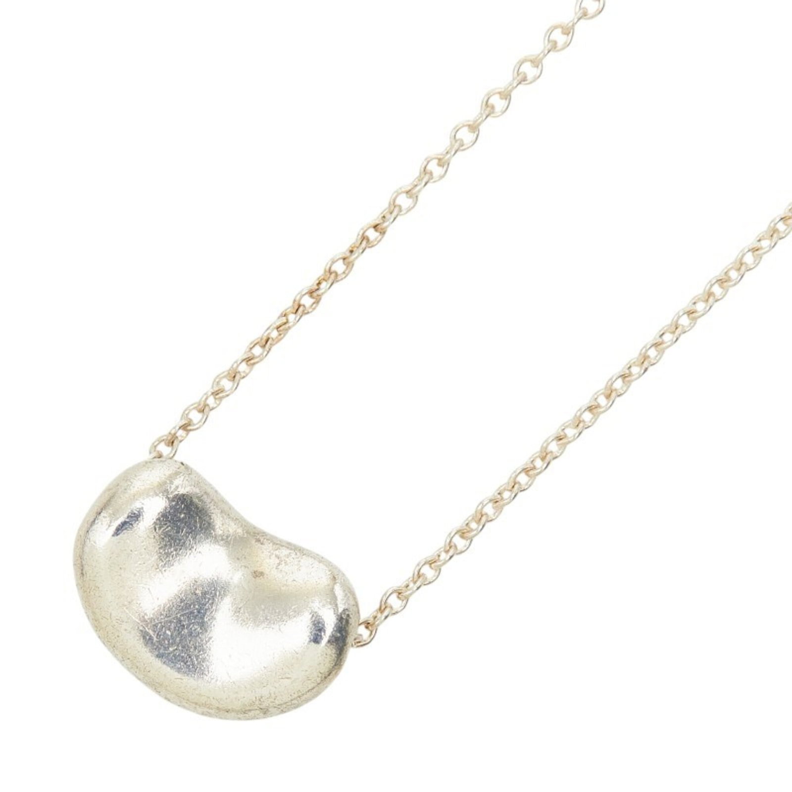 Tiffany & Co. Beans Necklace Sv925 Silver Women'S.: Tiffany & Co. Beans Necklace Sv925 Silver Women'S. Tiffany & Co. Beans Necklace in sterling silver (925) features a delicate design with a pendant size of 7.7mm x 11.1mm, set against a comfortable nec