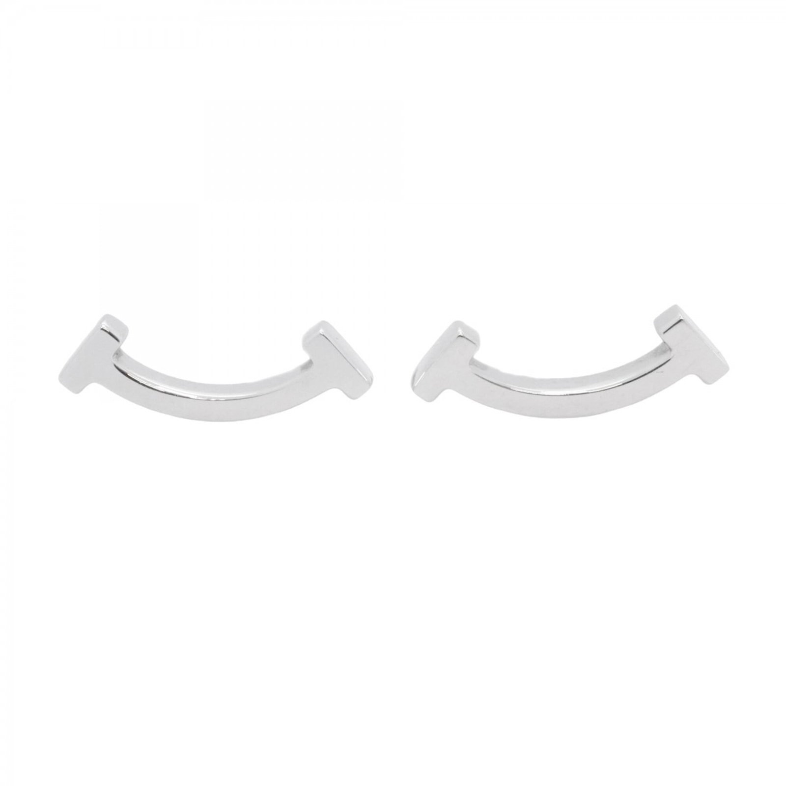 White Gold 18K Tiffany Stud Earrings: White Gold 18K Tiffany Stud Earrings White Gold 18K Tiffany Stud Earrings are crafted from high-quality white gold, offering a luxurious touch to any outfit. With their classic stud design and subtle 