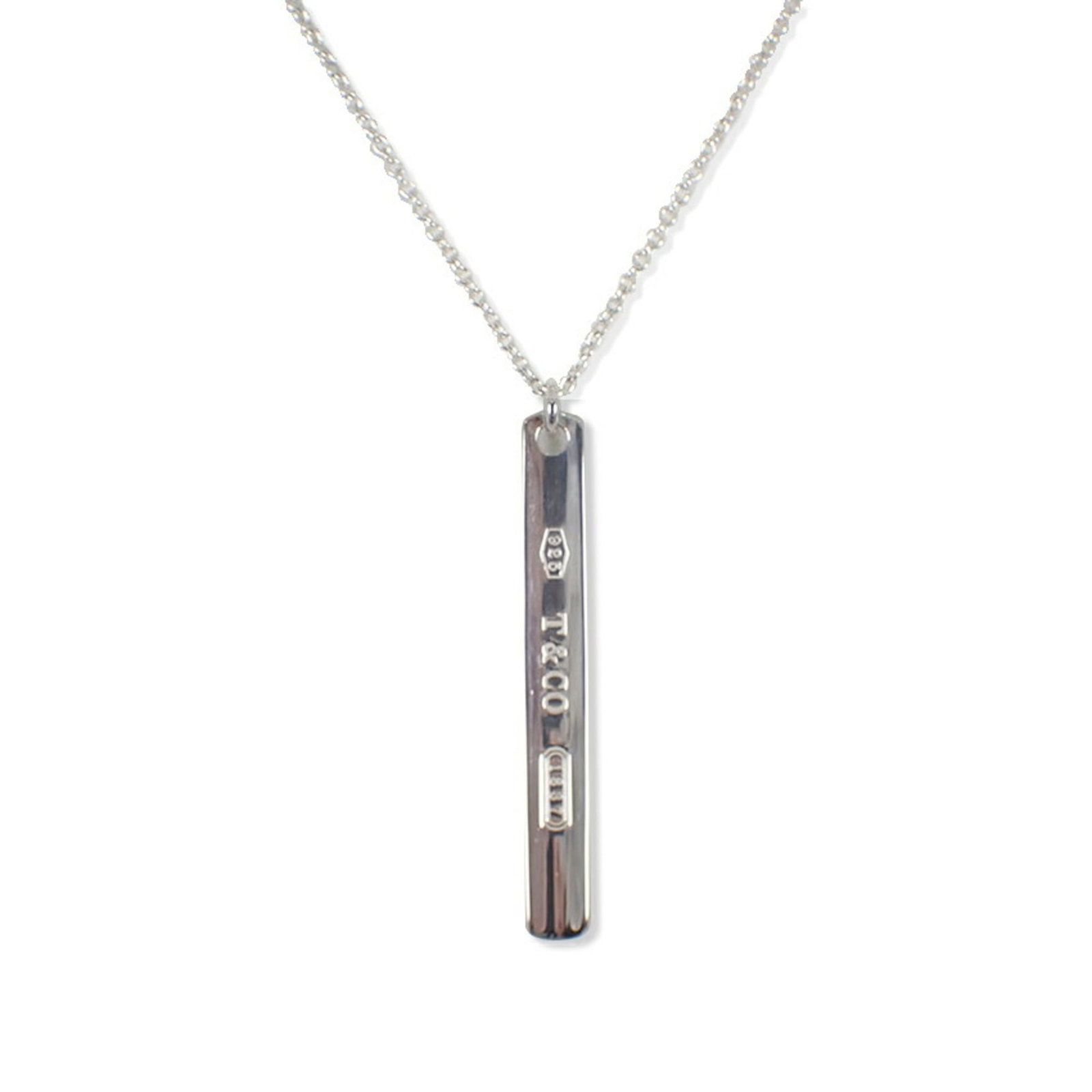 Tiffany & Co. 925 1837 Bar Pendant Necklace: Tiffany & Co. 925 1837 Bar Pendant Necklace Sterling silver 925, the Tiffany & Co. 1837 Bar Pendant Necklace boasts a classic design with a timeless elegance. The necklace features a 31mm x 4mm