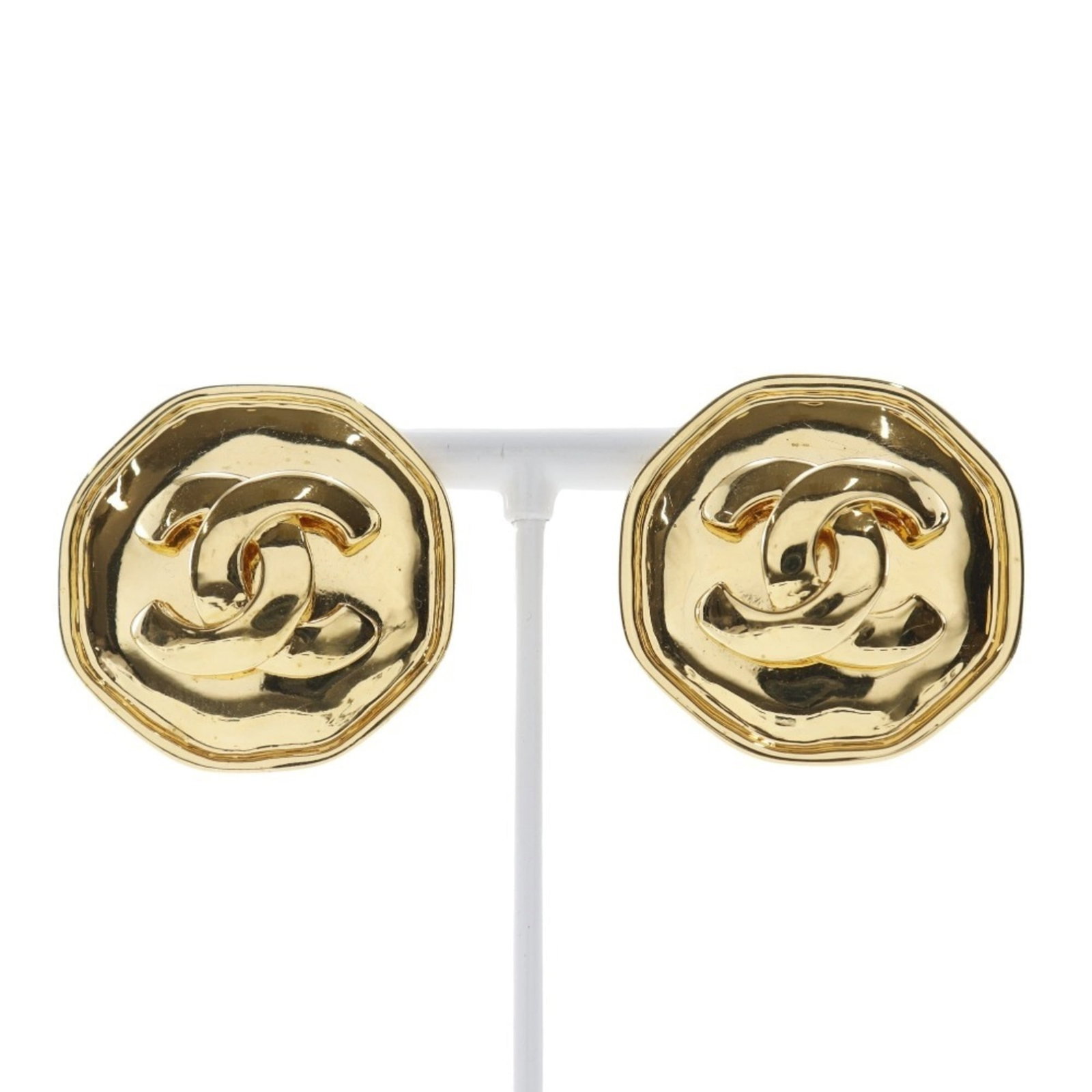 Clip earrings gold plating by Chanel: Clip earrings gold plating by Chanel Clip earrings in gold plating by Chanel, featuring a classic design with a subtle touch of luxury. These elegant earrings are made from durable gold-plated
