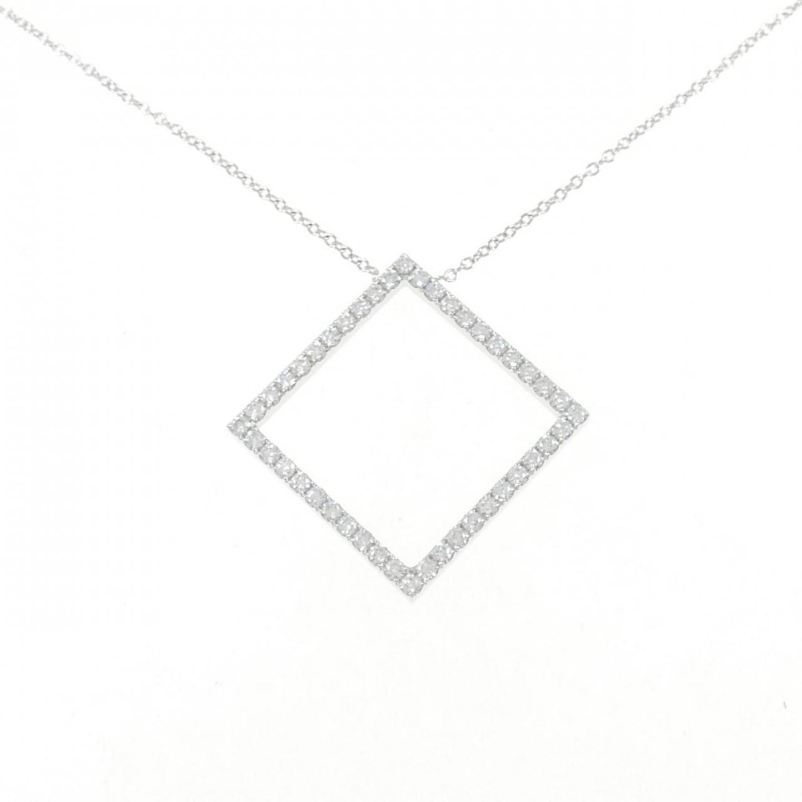 Metro Necklace by Tiffany: Metro Necklace by Tiffany White gold pendant featuring a diamond, crafted by Tiffany. The necklace boasts a classic design with a 41 cm circumference and measures 27.8mm x 27.8mm. A few traces of usag