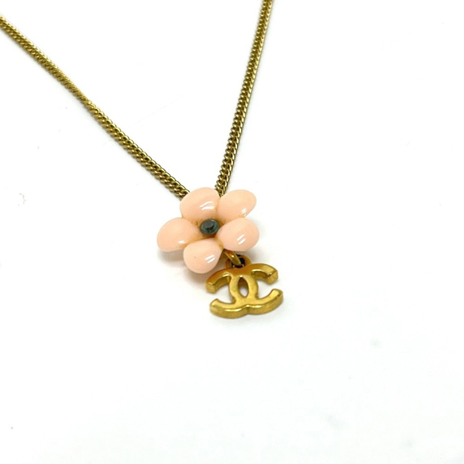Coco Chanel Necklace Chain In Gold Camellia Flower Mark A: Coco Chanel Necklace Chain In Gold Camellia Flower Mark A Gold Camellia Flower Mark A Necklace Chain from Chanel, featuring a delicate gold chain with a 20mm x 10.5mm pendant bearing the iconic camell