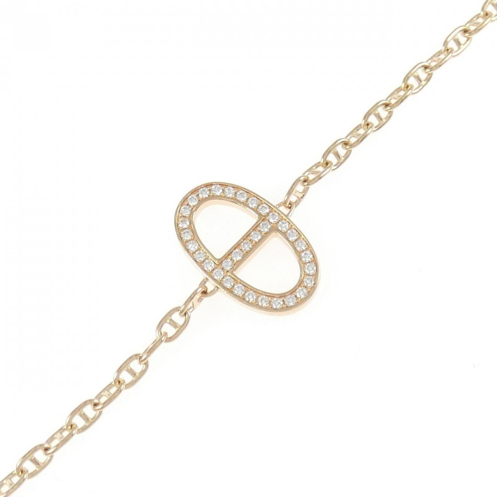 Pink Gold 18K Hermes Charm Bracelet: Pink Gold 18K Hermes Charm Bracelet Pink Gold 18K Hermes Charm Bracelet, featuring a beautiful pink gold finish and adorned with diamonds, adds a touch of elegance to any outfit. Measuring 18cm in len