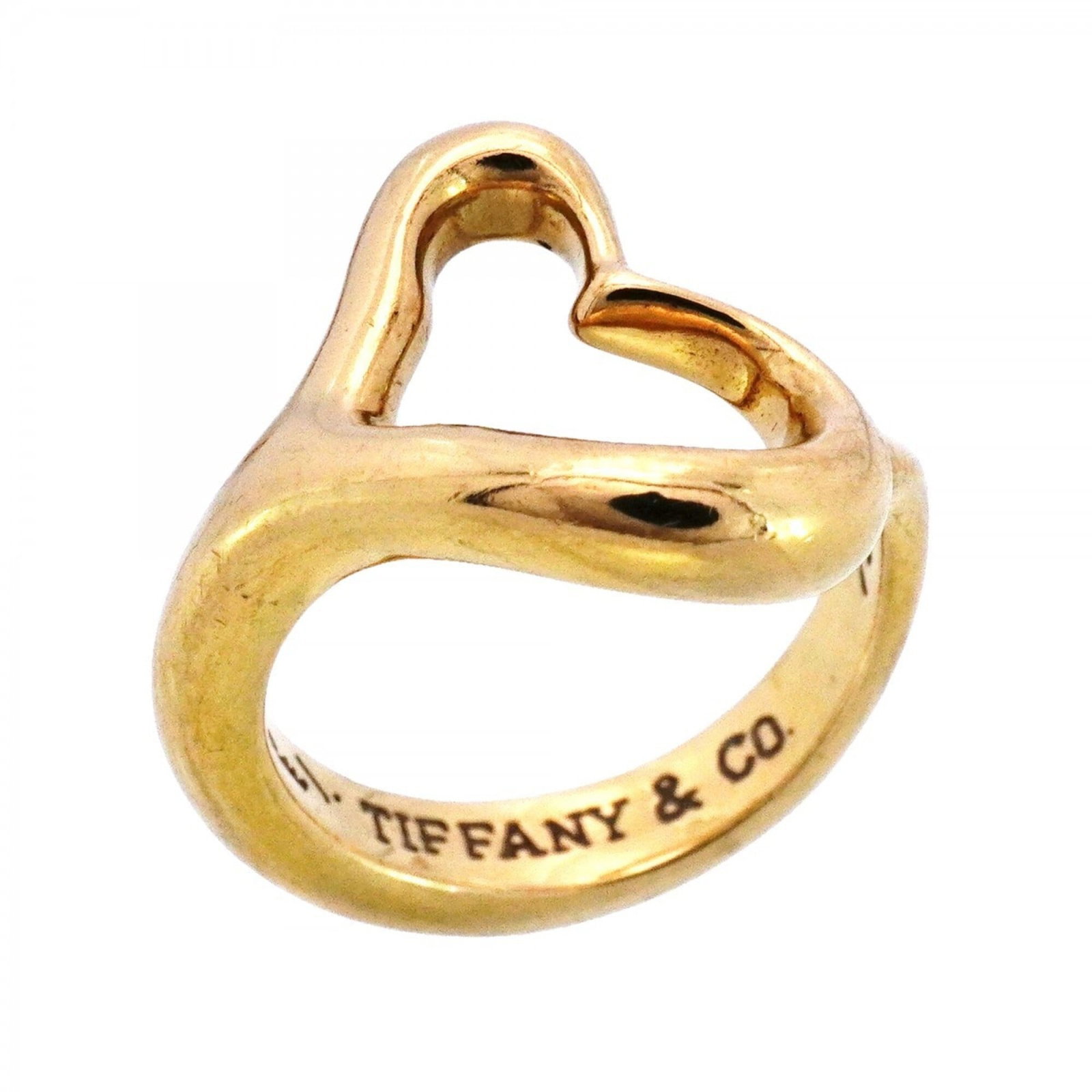 Tiffany Ring Gold Yellow 18K: Tiffany Ring Gold Yellow 18K Tiffany Ring Gold Yellow 18K - A classic women's band ring in yellow gold (18K) with a timeless design. The ring features traces of usage and minor scratches, but remains 