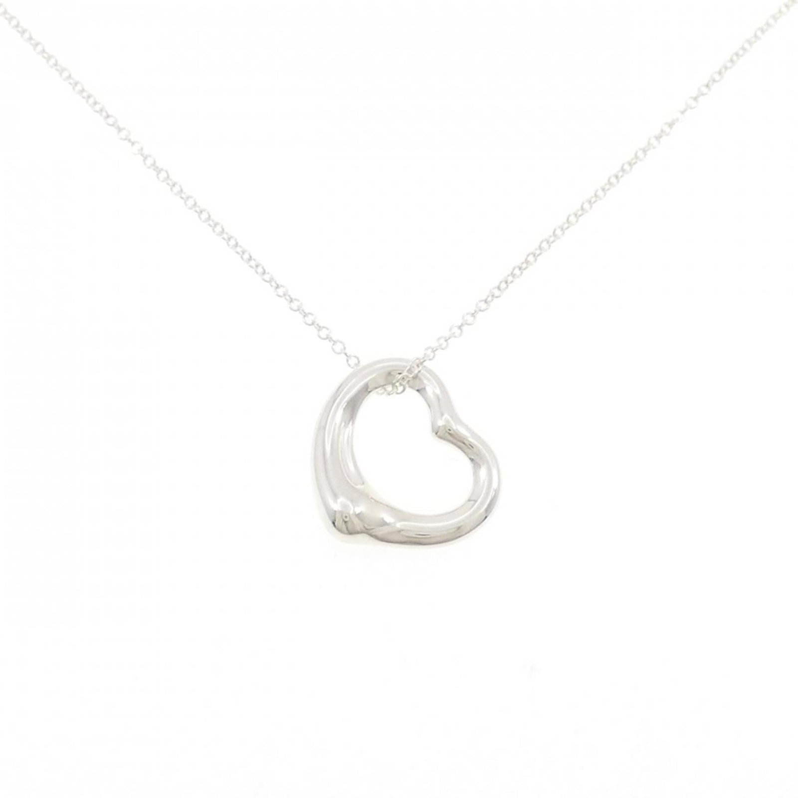 Heart Open Tiffany Necklace: Heart Open Tiffany Necklace Silver 925 Heart Open Tiffany Necklace with a pendant size of 15.8mm x 15.2mm, set against a chain designed for a neck circumference of 41 cm / 16.14''. This necklace featu