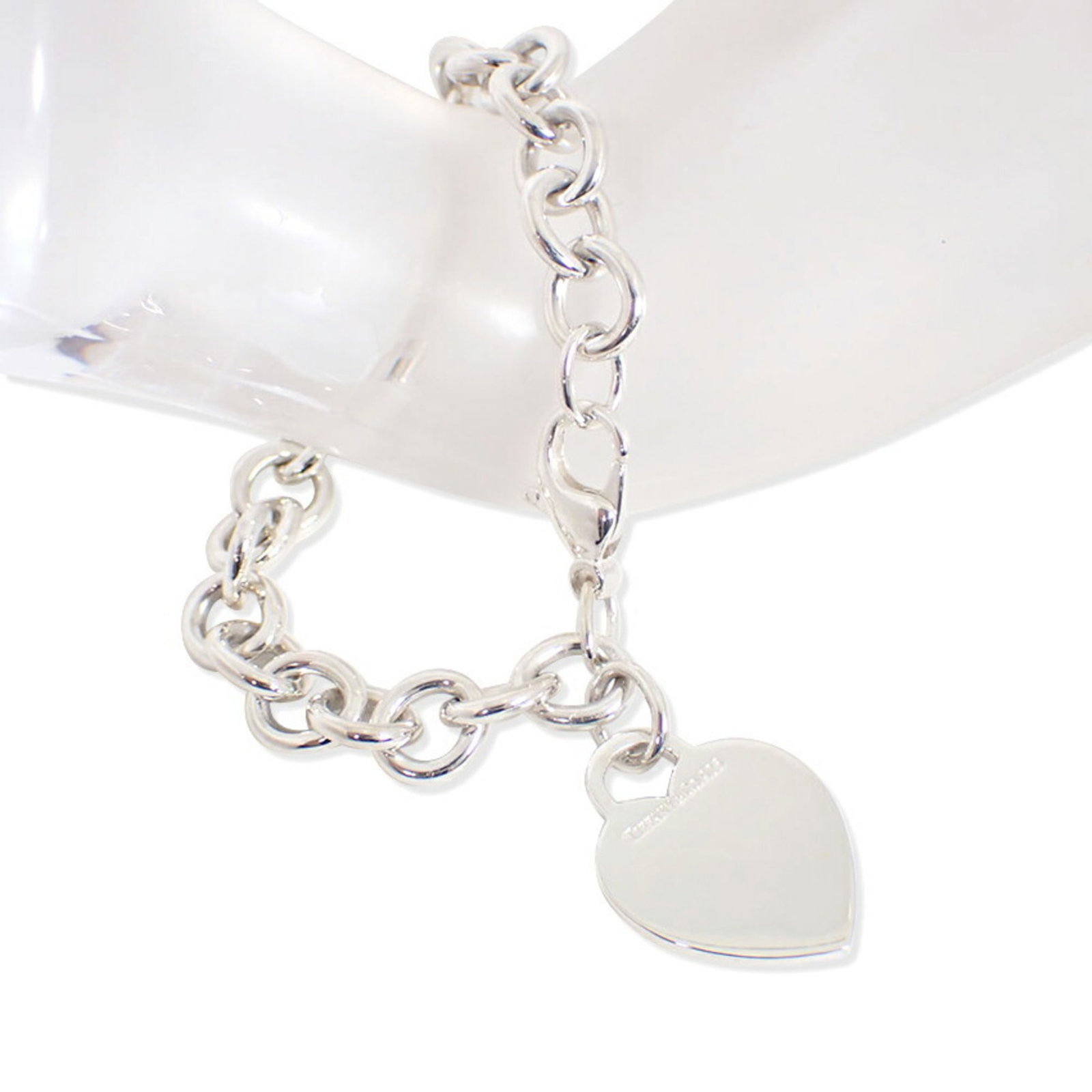 Silver 925 Tiffany Charm Bracelet: Silver 925 Tiffany Charm Bracelet Silver 925 Tiffany Charm Bracelet - A Sterling Silver 925 charm bracelet from the iconic Tiffany brand, featuring a sleek and modern design. Made from high-quality st