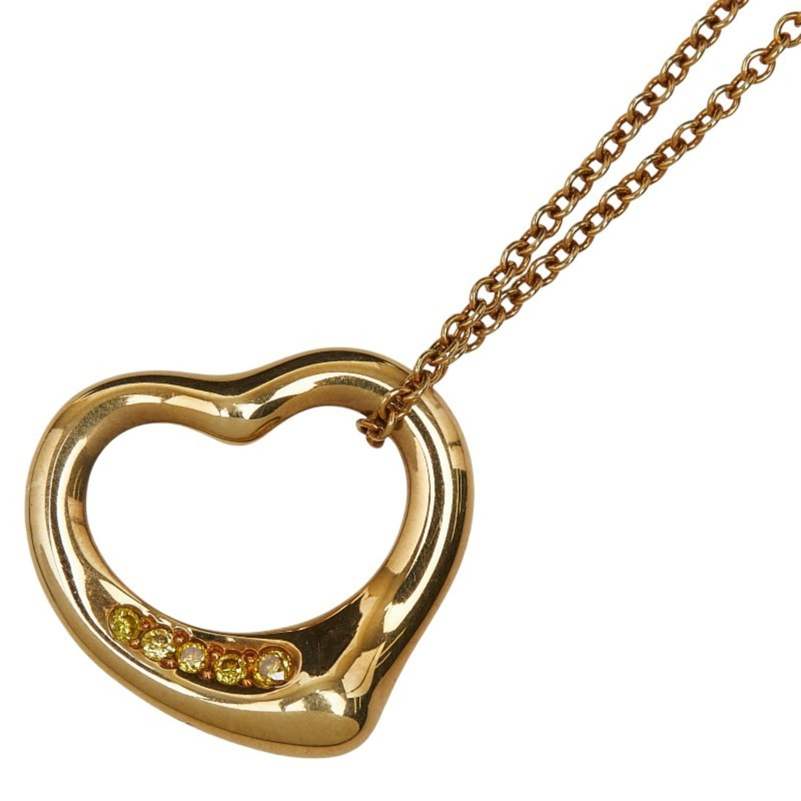 Open Heart Necklace In 18K Yellow Gold By Women's: Open Heart Necklace In 18K Yellow Gold By Women's Open Heart Necklace In 18K Yellow Gold By Tiffany & Co. - A timeless piece featuring an elegant open heart design, crafted in 18k yellow gold and boas