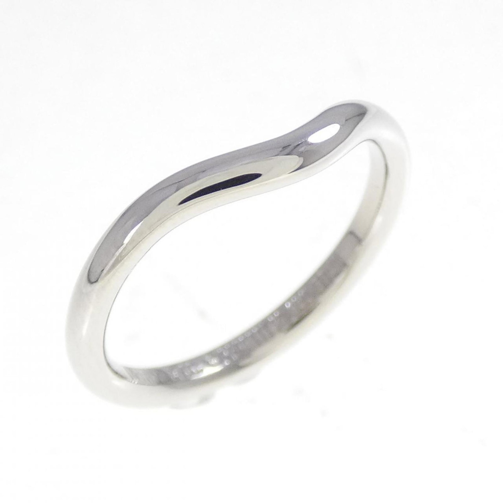 Platinum ring by Tiffany band: Platinum ring by Tiffany band Platinum ring by Tiffany features a high-quality band made from 950 platinum, with a classic design that exudes timeless elegance. The ring bears some minor traces of usa