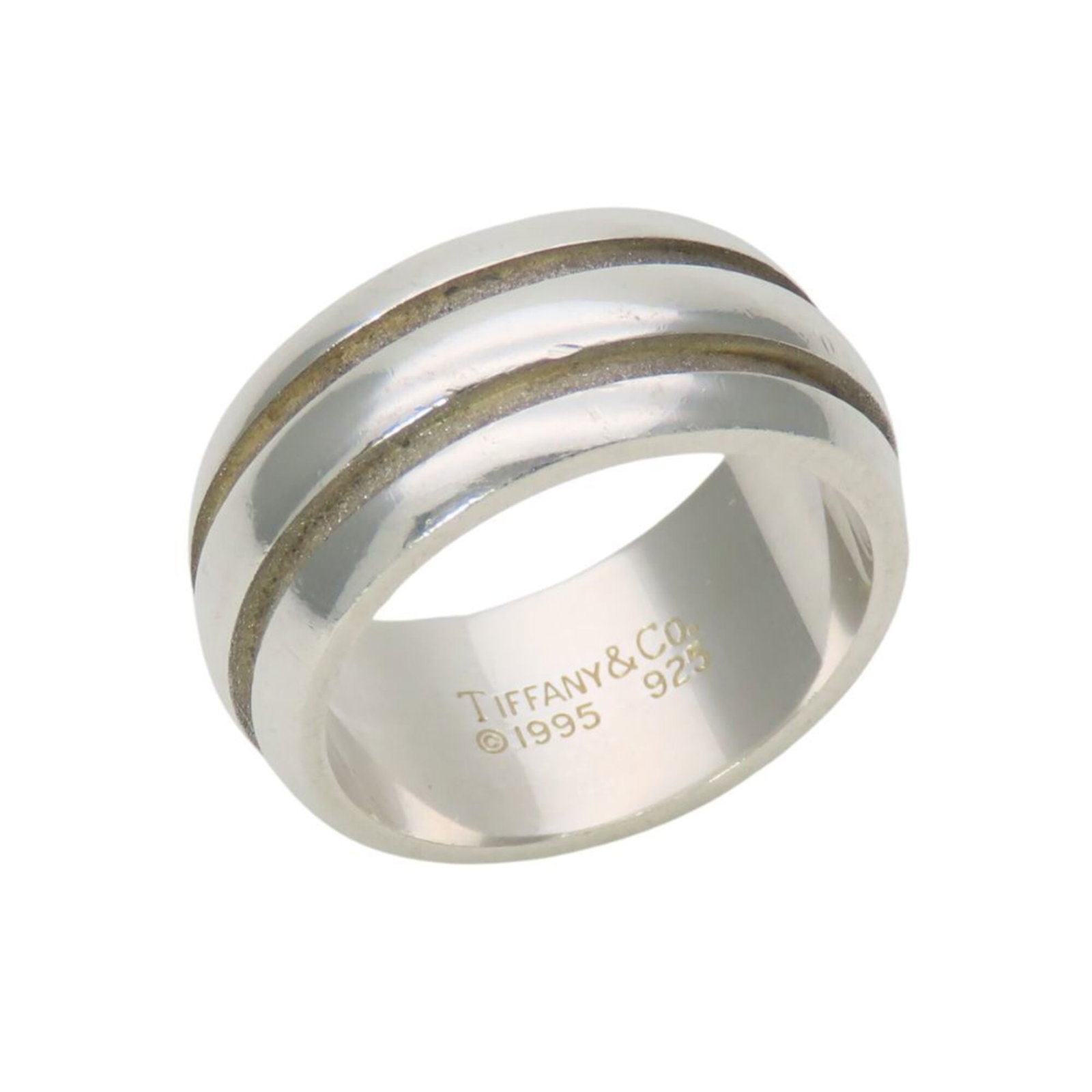 Tiffany Band Ring Silver 925: Tiffany Band Ring Silver 925 Silver band ring from Tiffany, featuring a 12.50mm stone set in a 9.01mm wide band with a silver 925 material and US size 6.5. The ring bears traces of usage and minor scr