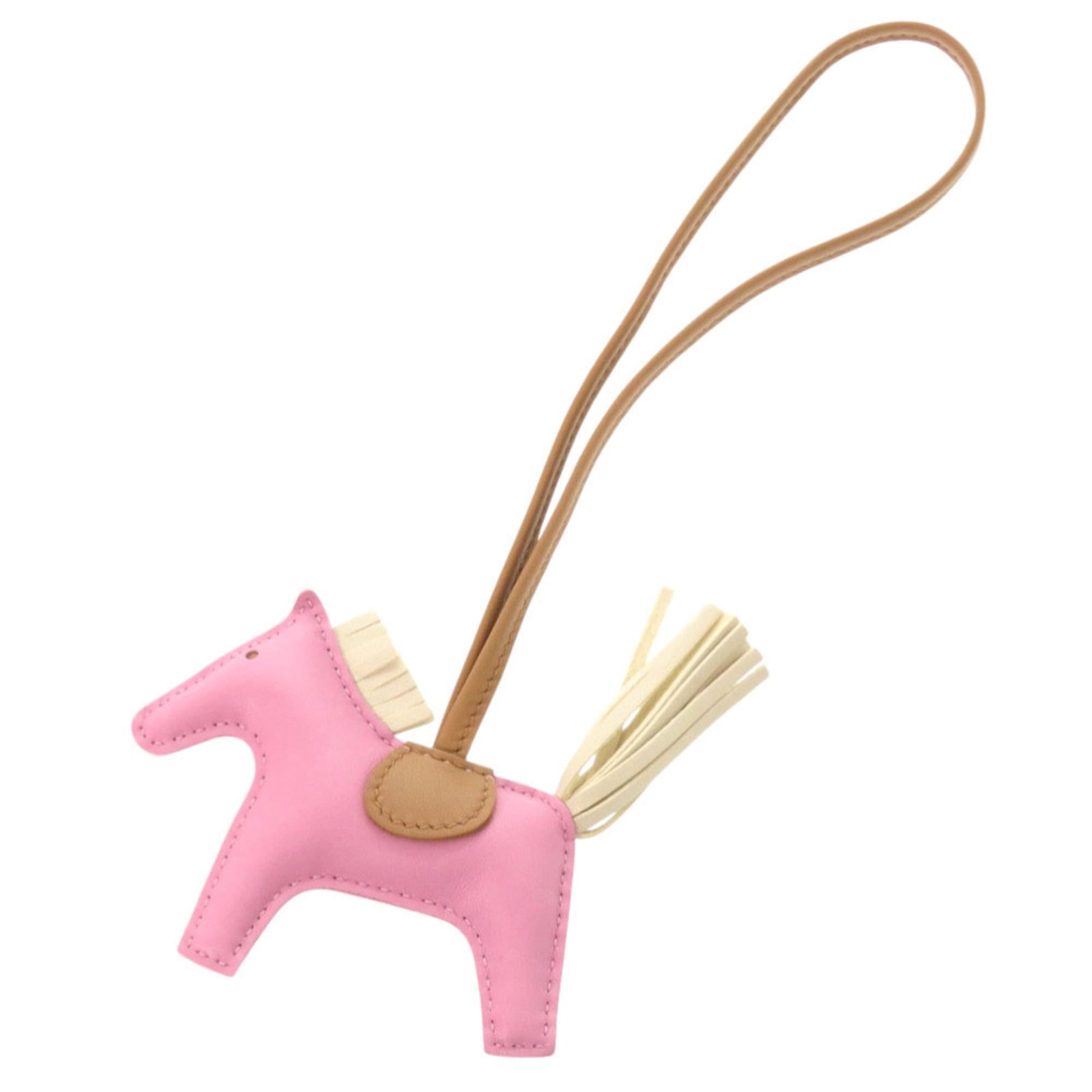 Hermes Handbag Charm Agneau Milo: Hermes Handbag Charm Agneau Milo Agneau Milo, a luxurious material used in the creation of this handbag charm from renowned brand Hermes. The charm boasts a beautiful brown and pink color