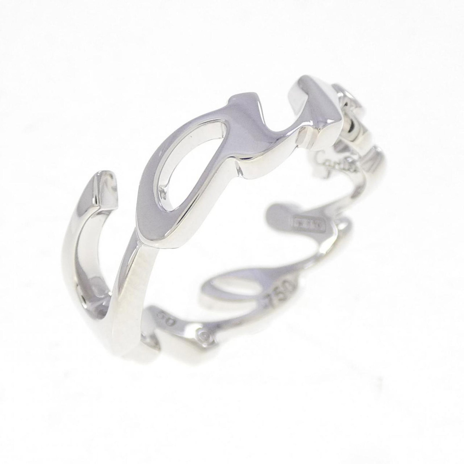 White Gold Cartier Band Ring 18K: White Gold Cartier Band Ring 18K White Gold Cartier Band Ring 18K. This 50mm band ring features 18k white gold, bearing some traces of usage and minor scratches/dirt. In very good condition, it