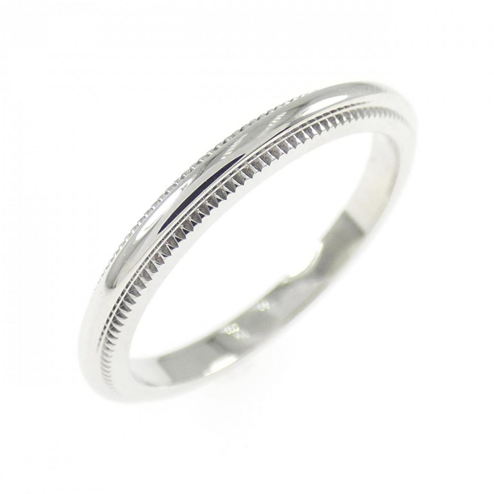 Platinum ring by Tiffany band: Platinum ring by Tiffany band Platinum ring by Tiffany features a sleek design with a 950 platinum band, available in US size 3.5 and measuring 1.9mm in width. The ring bears some scratches and minor 