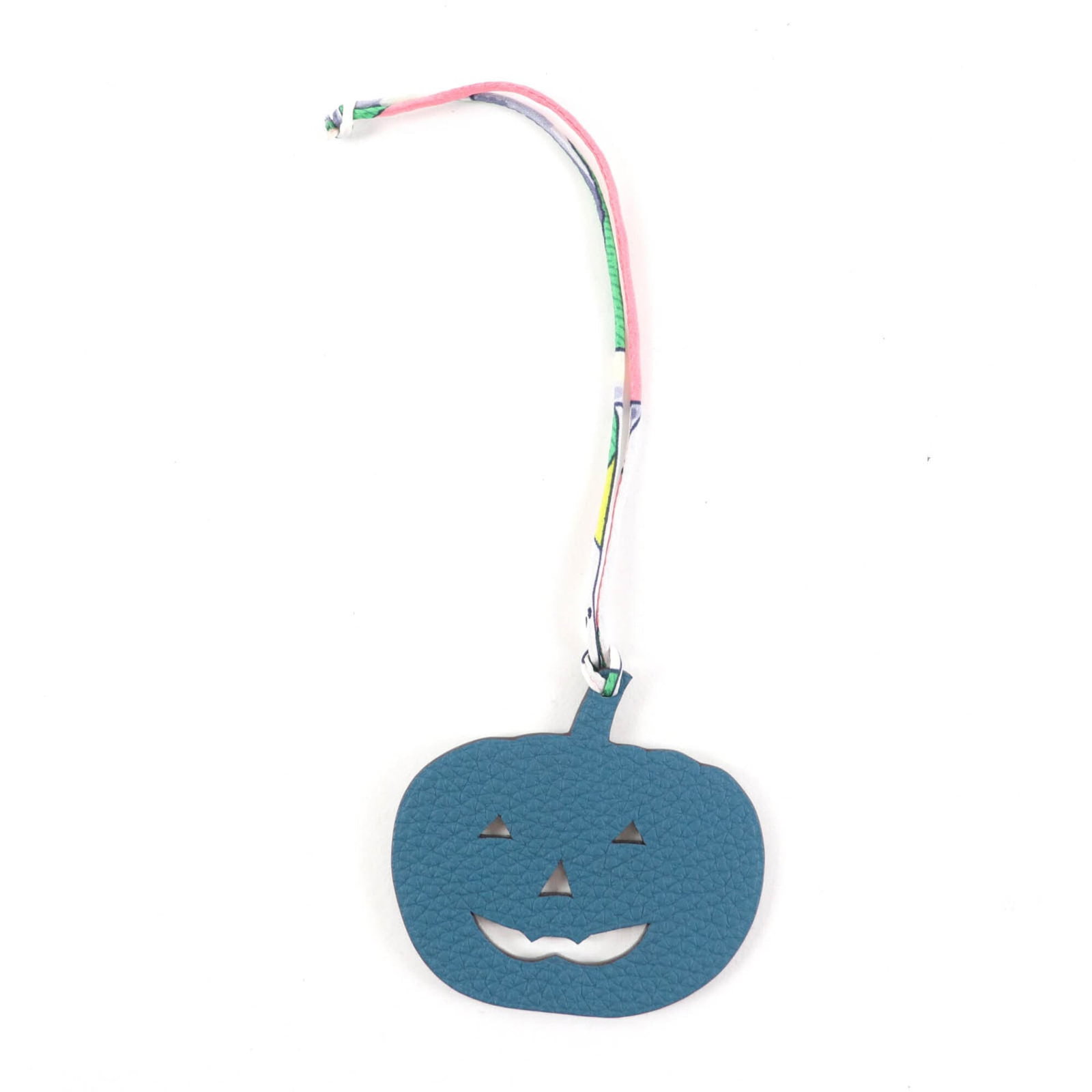 Hermes leather togo handbag charm: Hermes leather togo handbag charm Togo leather charm from iconic French fashion house Hermes, featuring a vibrant blue and green color combination. Measuring 67mm x 70mm, the charm boasts a sturdy