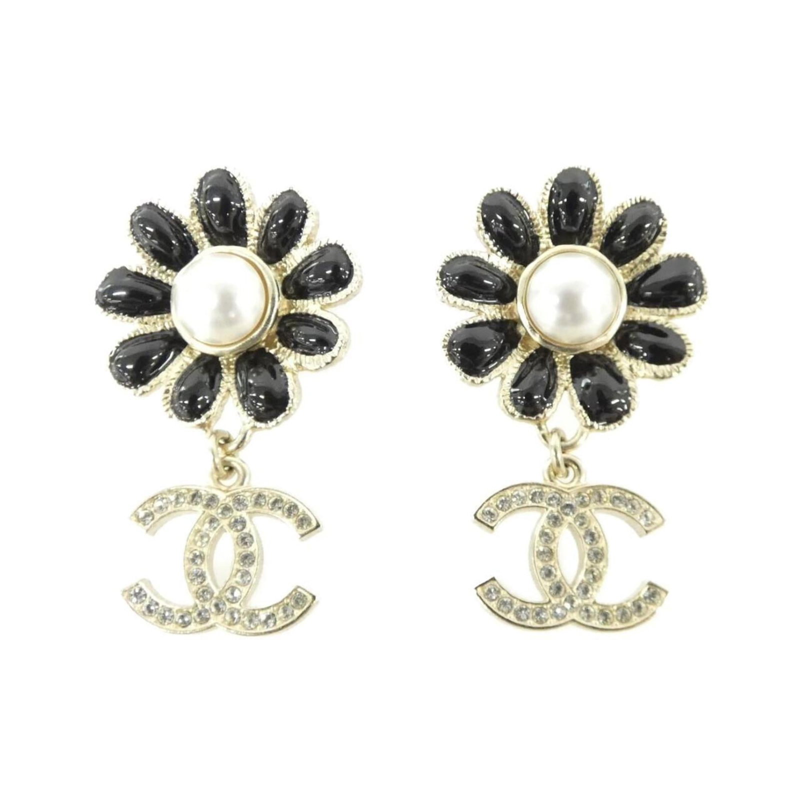 Chanel Stud Earrings: Chanel Stud Earrings Stud earrings from the iconic Chanel brand, featuring a sleek and timeless design. Made in black, gold, clear, or white, these versatile earring studs are perfect for adding a tou