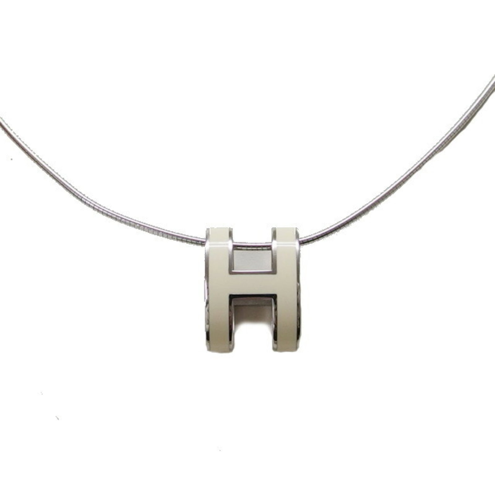 Hermes Pop H Silver White Chain Necklace: Hermes Pop H Silver White Chain Necklace Silver and white enamel details on a sleek silver chain make up the Hermes Pop H Silver White Chain Necklace. The necklace features a pendant measuring 16mm x