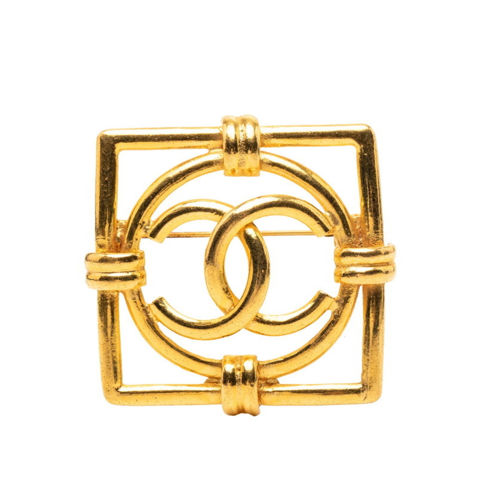 Chanel Brooch: Chanel Brooch Gold Chanel brooch with vintage charm, bearing subtle traces of usage and minor scratches. The delicate design measures 4.66cm x 4.66cm, showcasing its elegant simplicity. With its